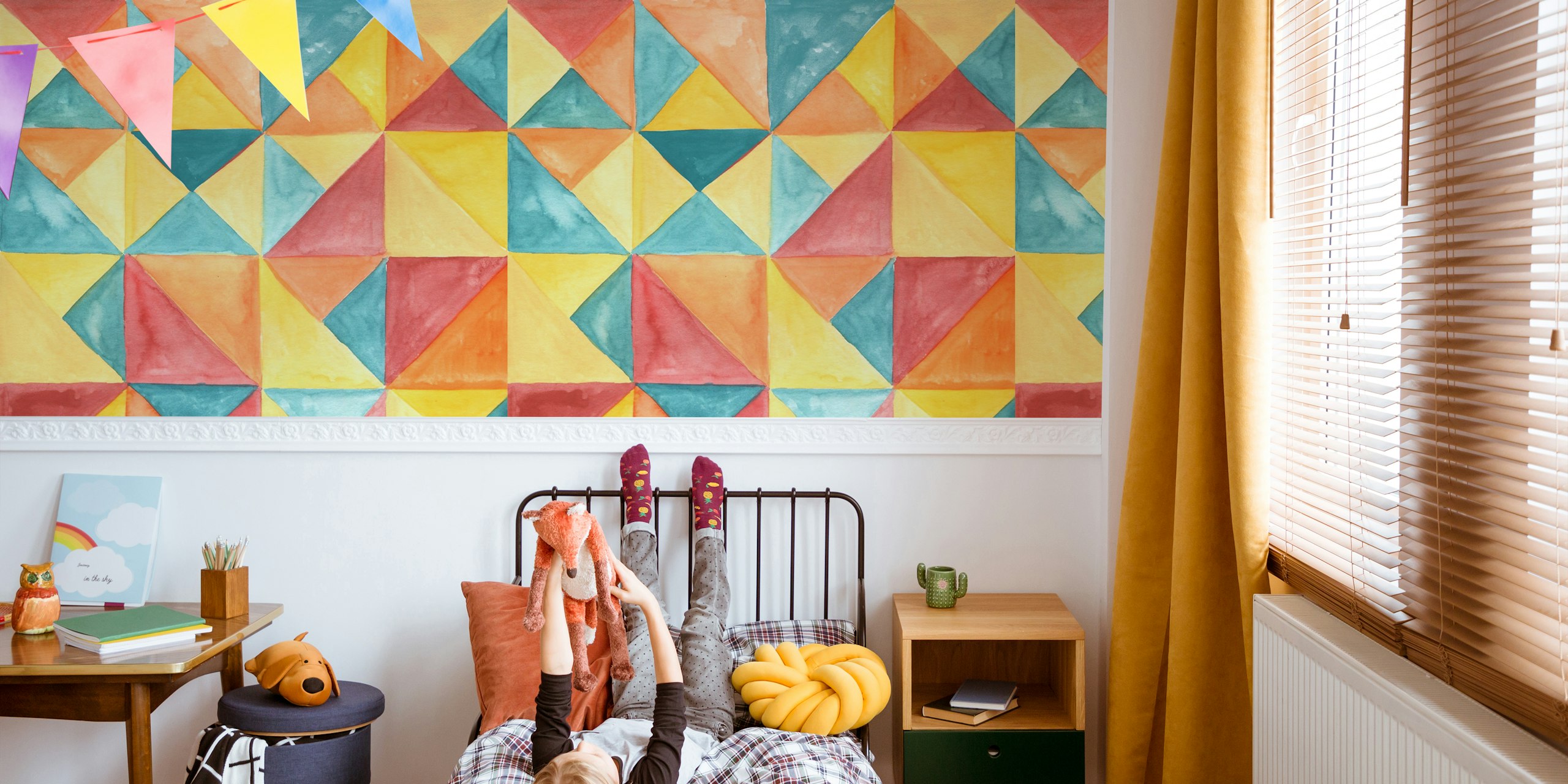 Colorful geometric shapes in yellow, teal, and coral wallpaper