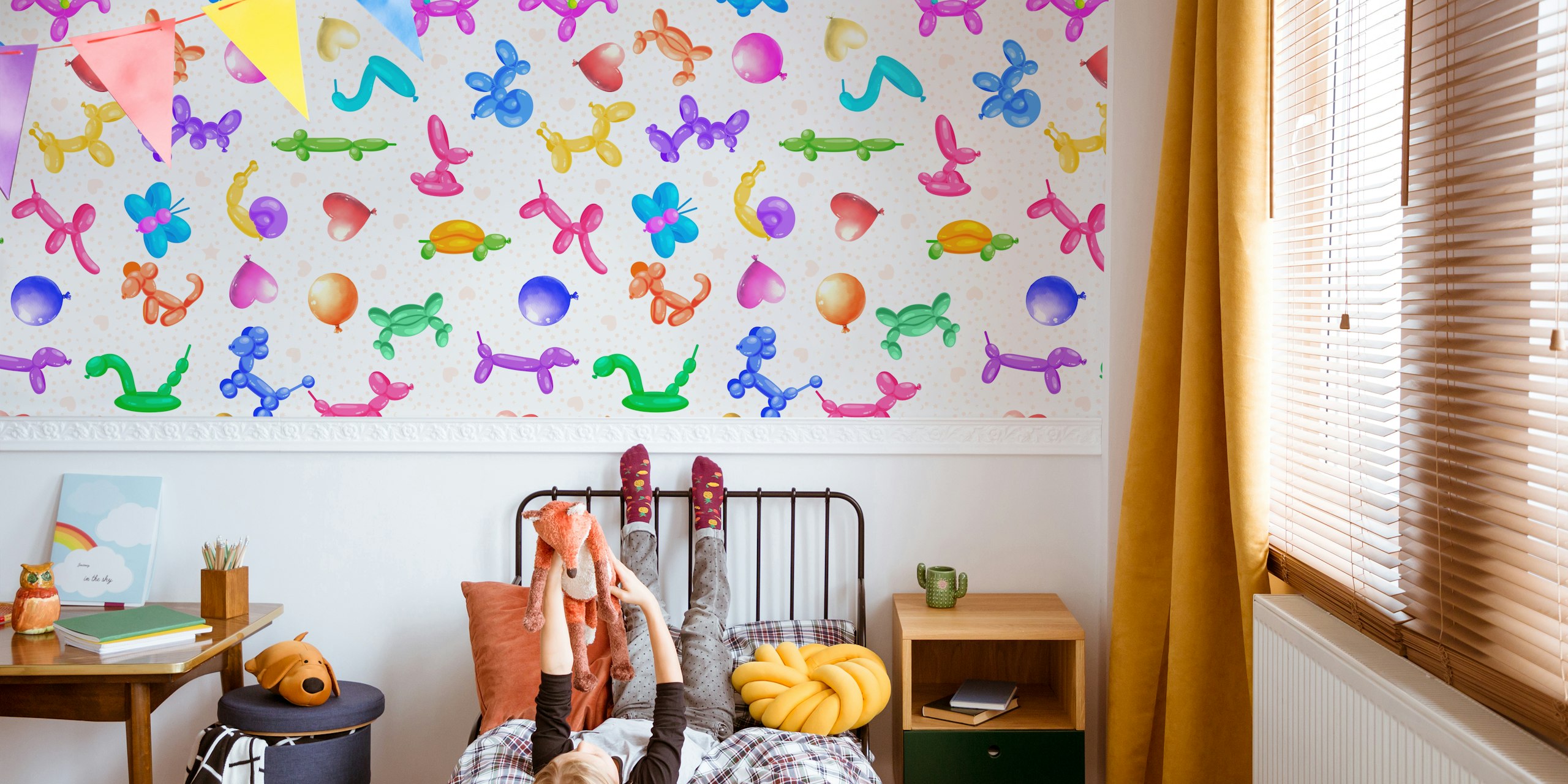 Colorful balloon animals on a polka dot background wallpaper
