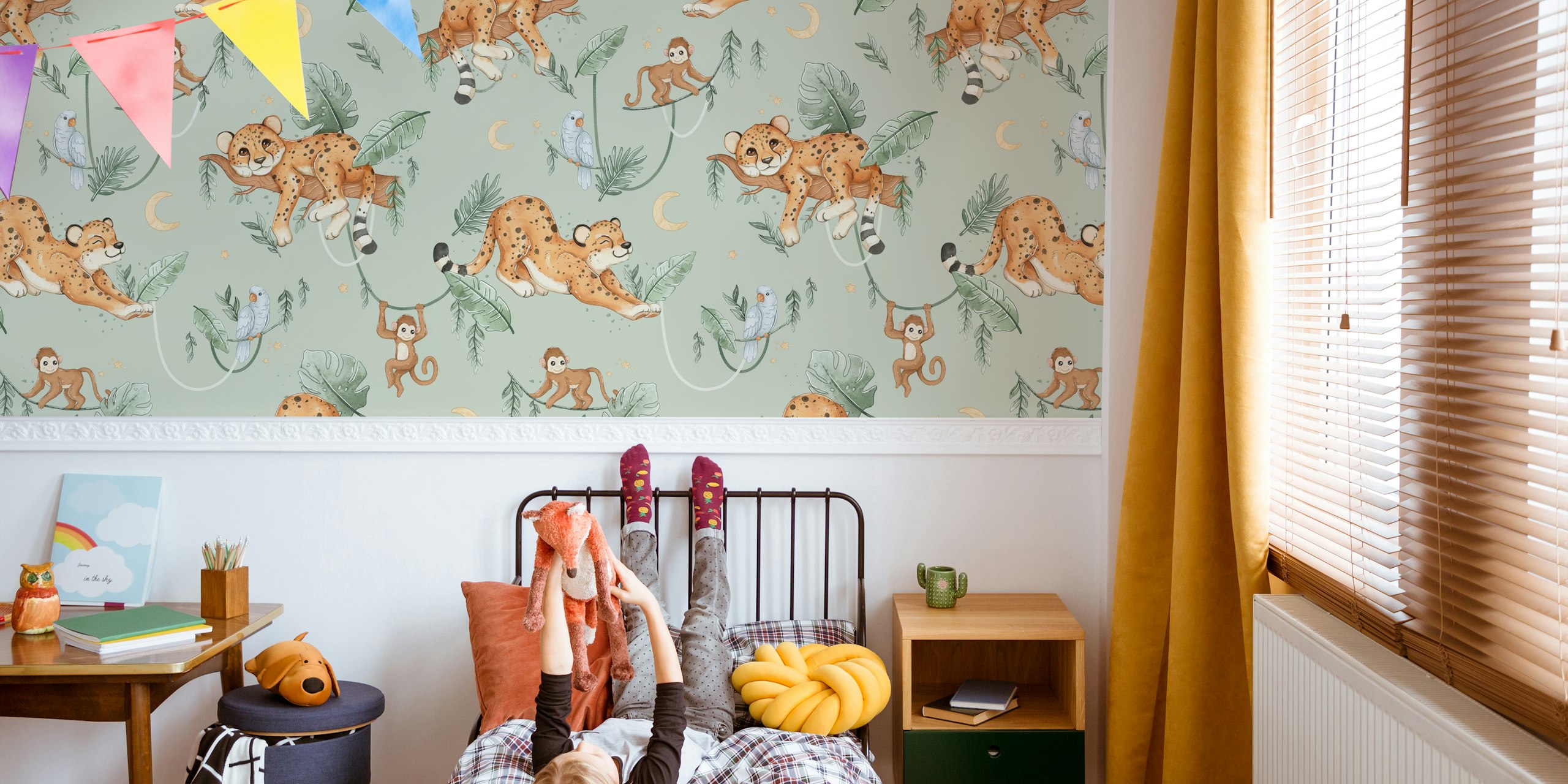 Leopards, monkeys, and birds with green leaves on mint green wallpaper.