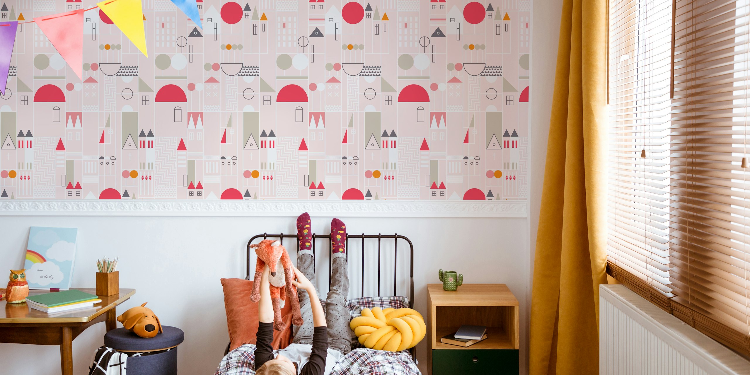 Geometric shapes and city-like illustrations in pink, red, and gray wallpaper