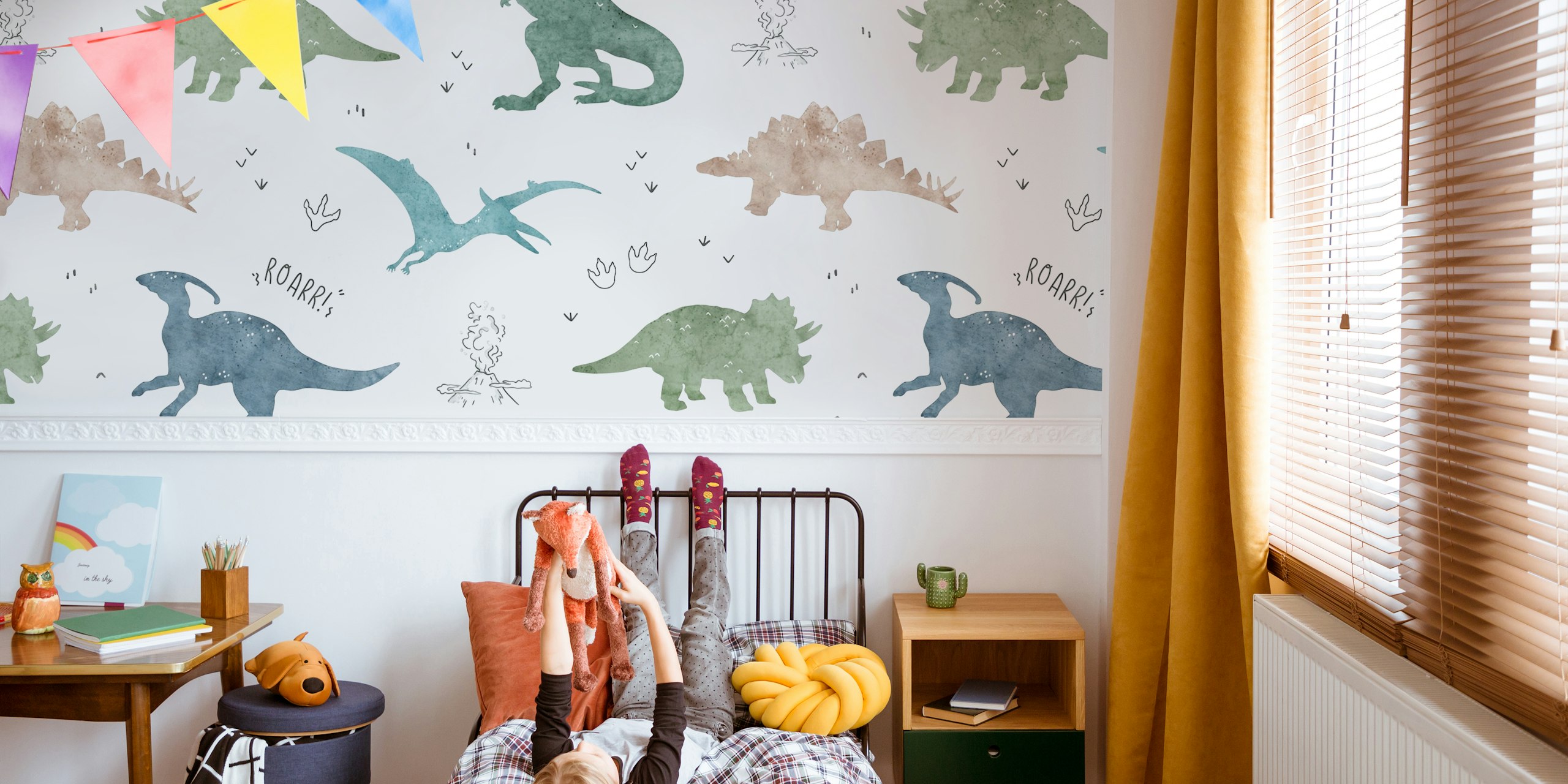 Playful dinosaur patterns in soft greens, browns, and white wallpaper