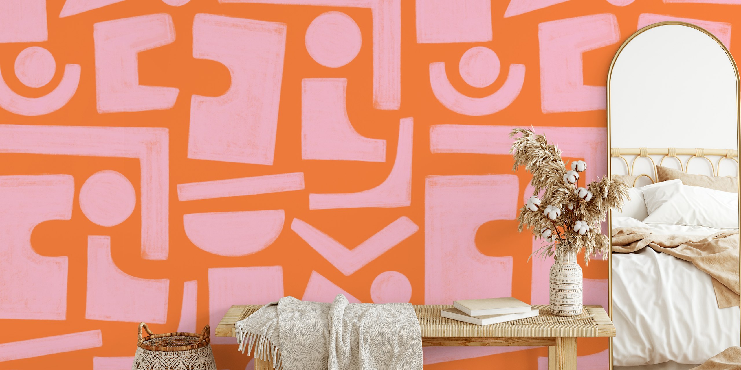 Geometric pink and orange wallpaper in a room