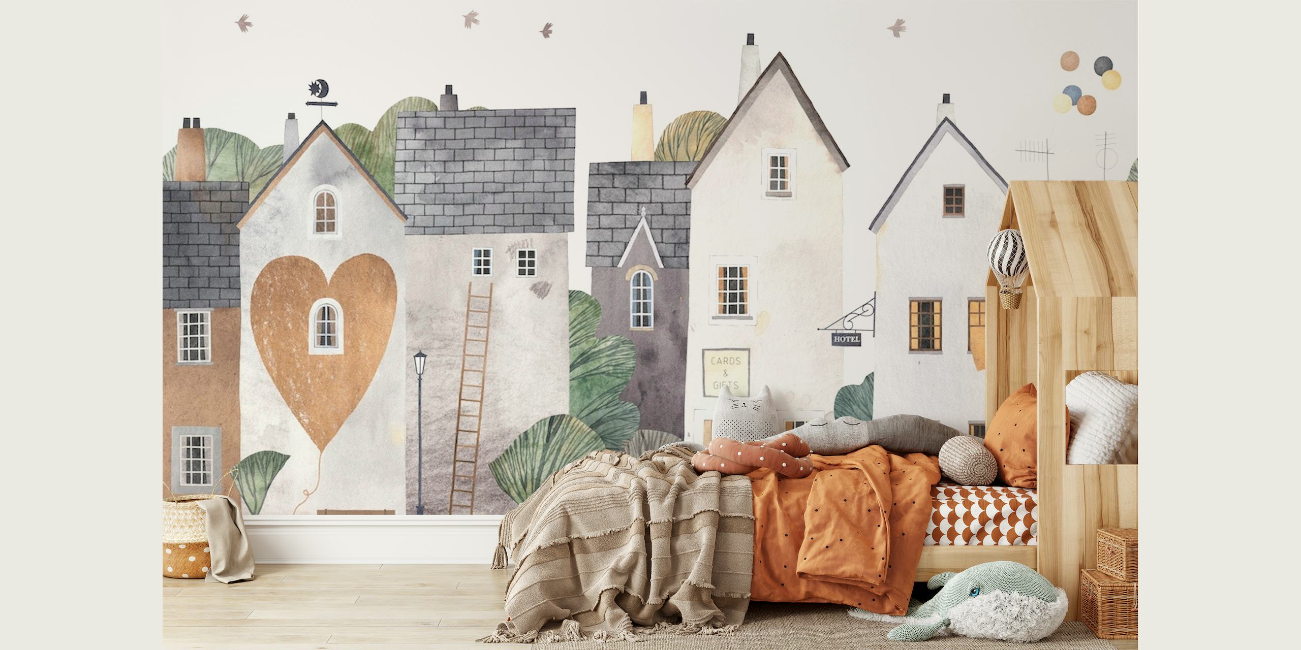 Illustrative wall mural of a whimsical cute town with storybook houses