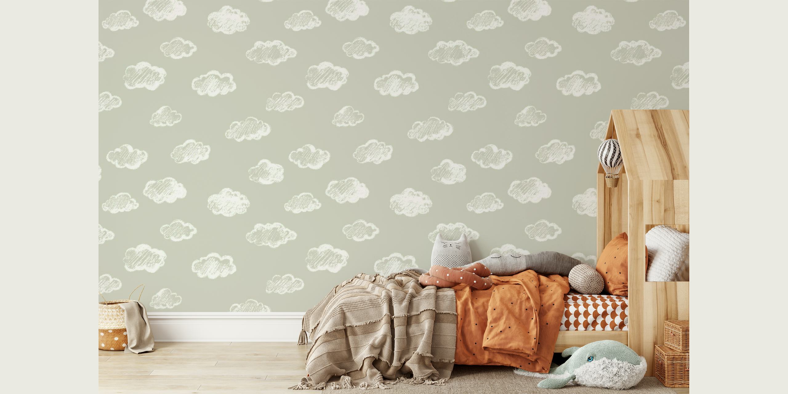 Decorazione murale con forme di nuvole bianche gessose su sfondo grigio tortora