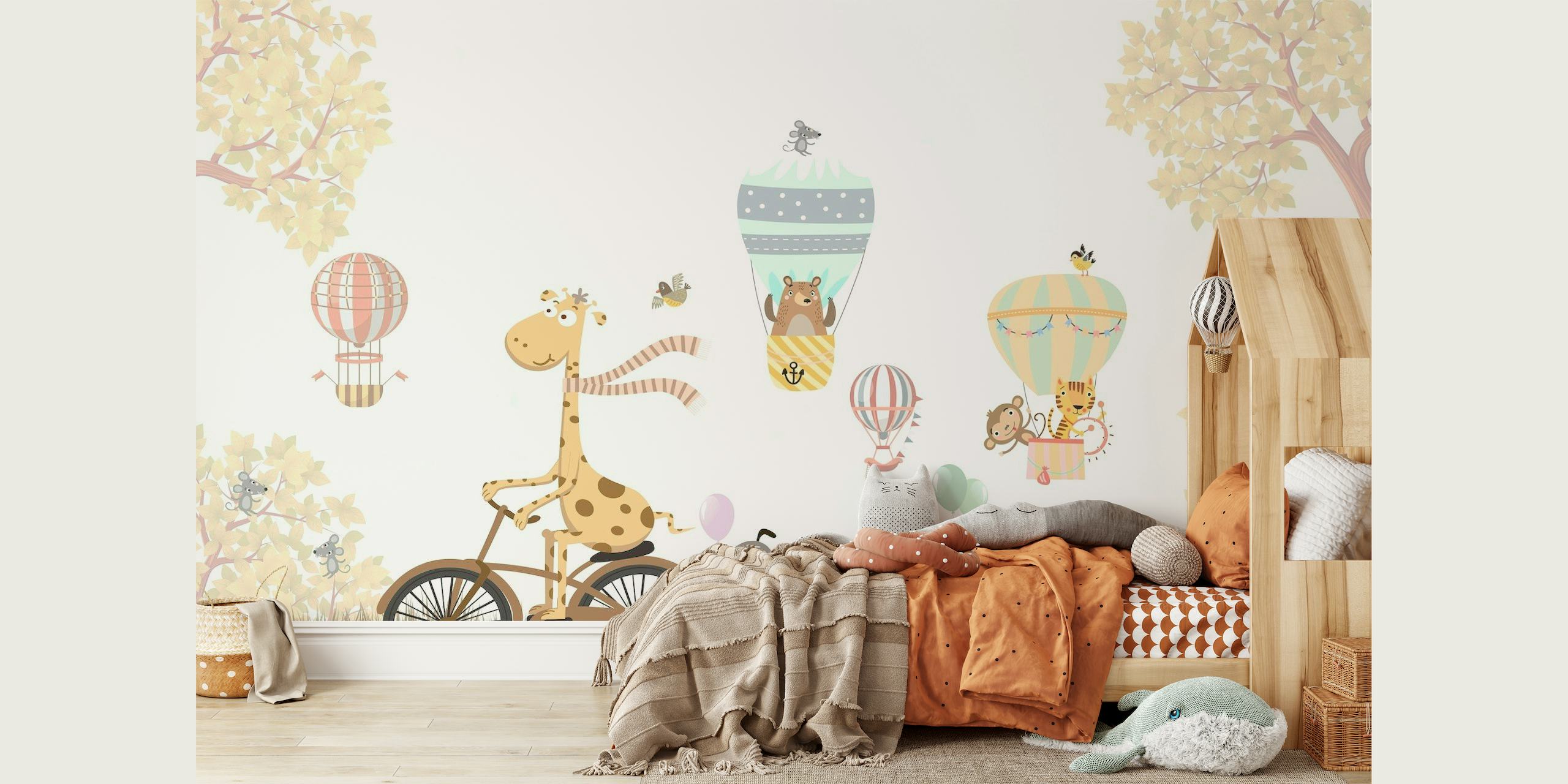 Illustration of animals on a bicycle and hot air balloons in a pastel-colored landscape wall mural