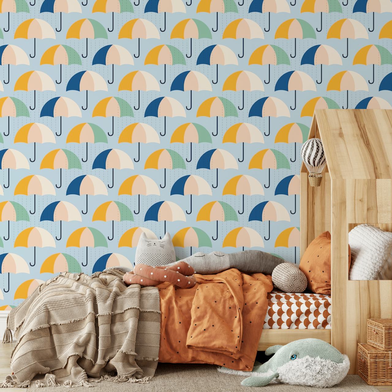 Colorful patterned umbrellas in blue, yellow, and cream wallpaper