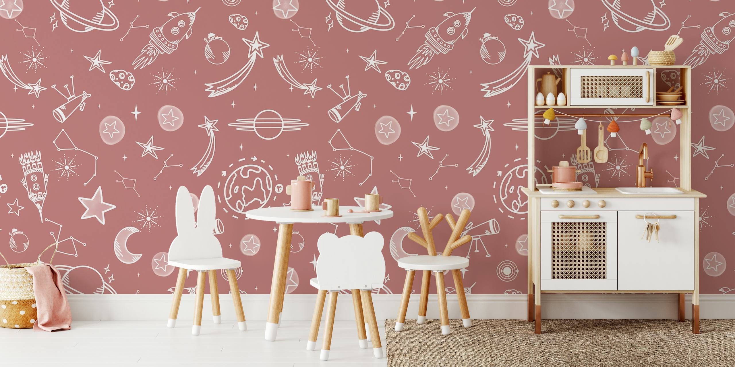 Space-themed pink wall mural with stars, planets, and moons