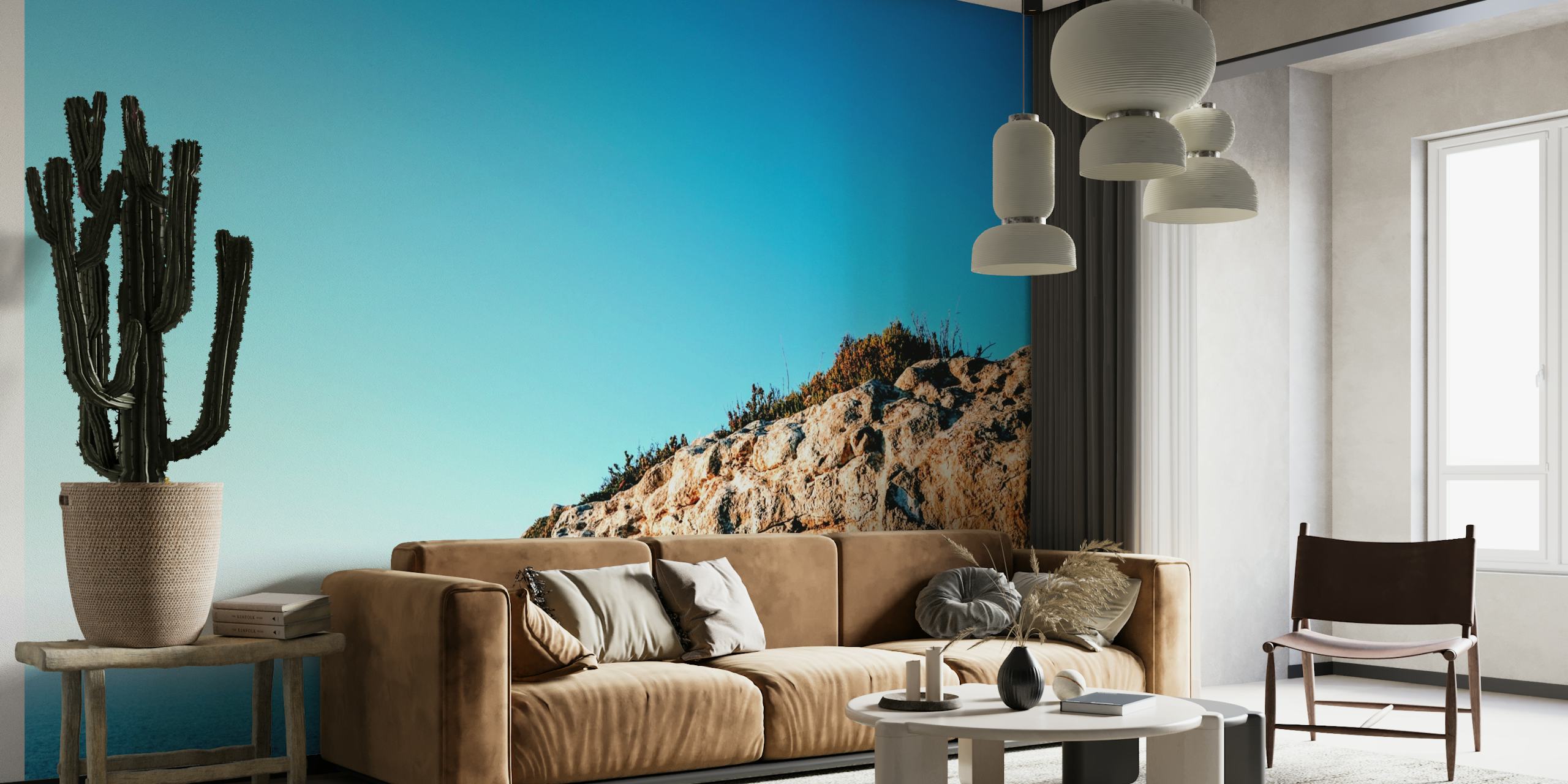 Suncem obasjane obalne stijene s pogledom na plavi oceanski zidni mural