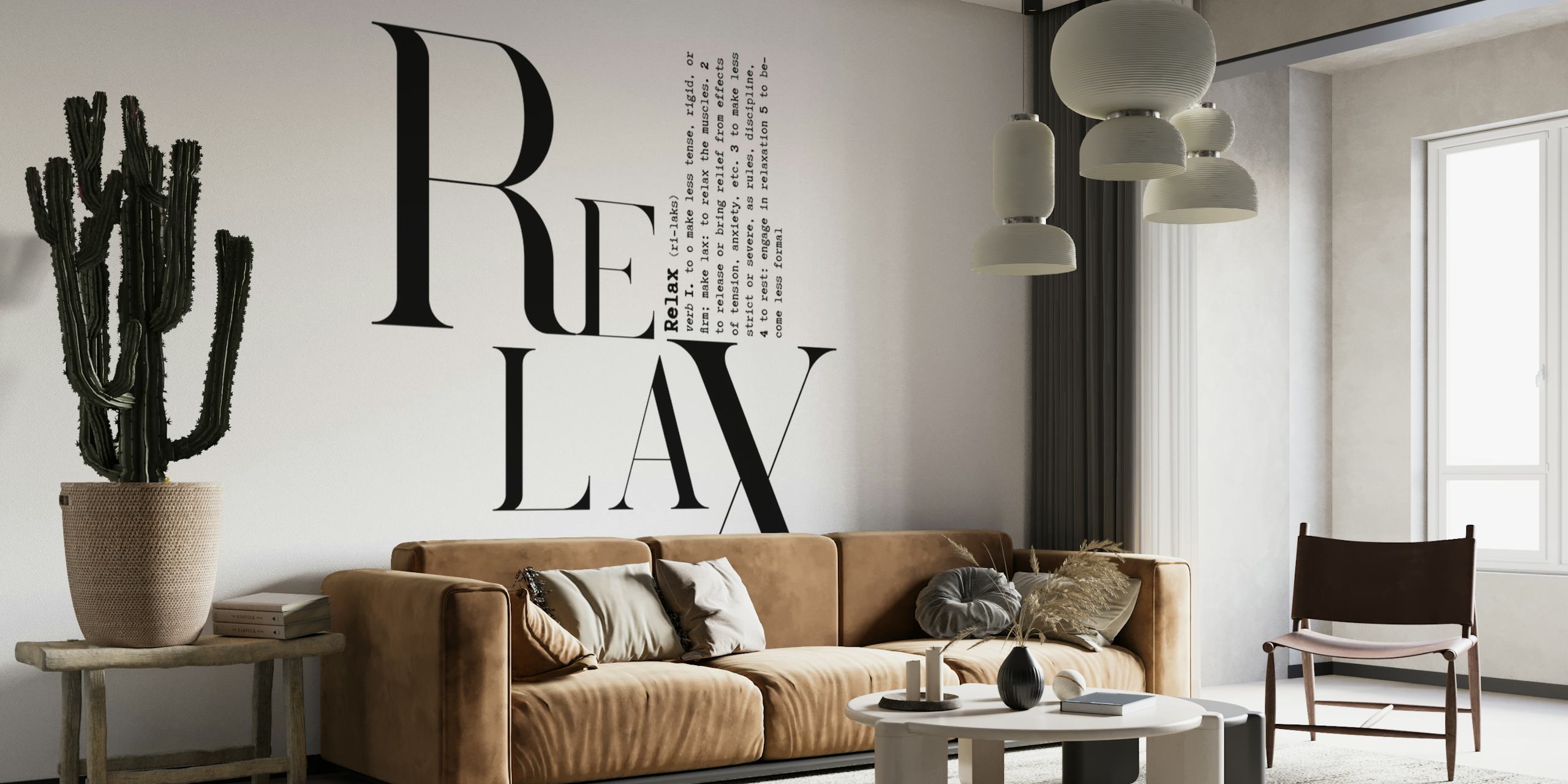 Mustavalkoinen typografinen seinämaalaus, jossa sana "RELAX" luovalla fontilla