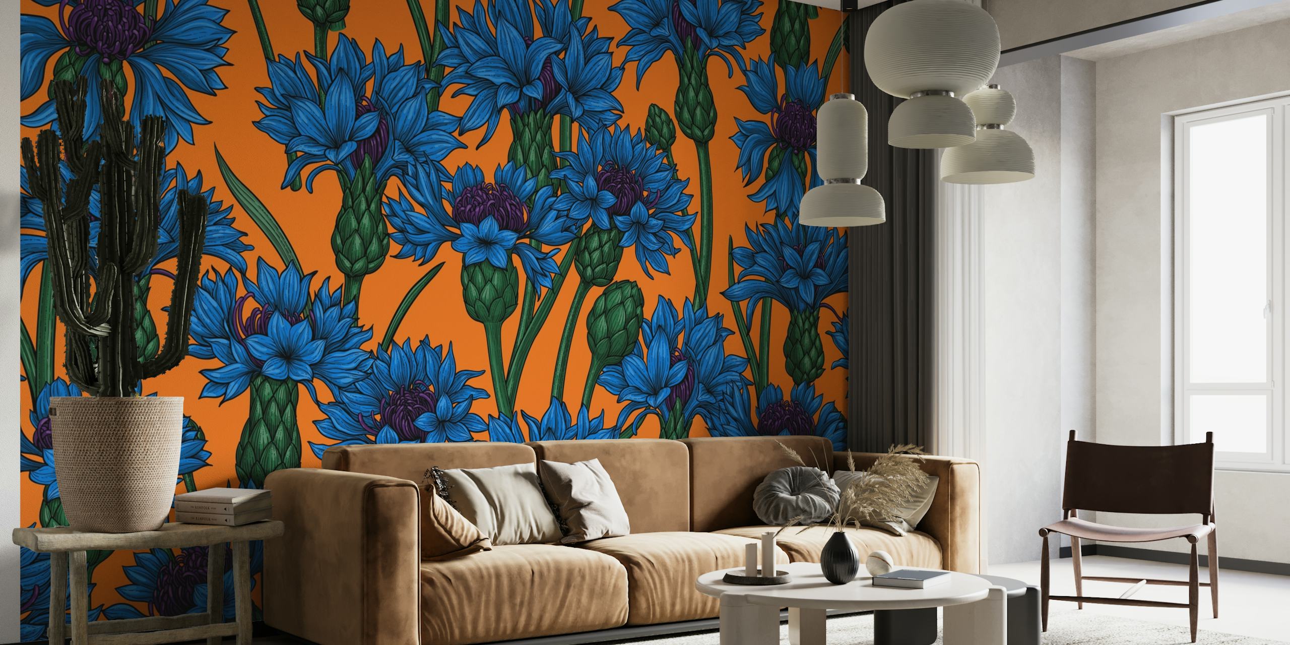 Blauwe korenbloemen op een oranje achtergrondmuurschildering