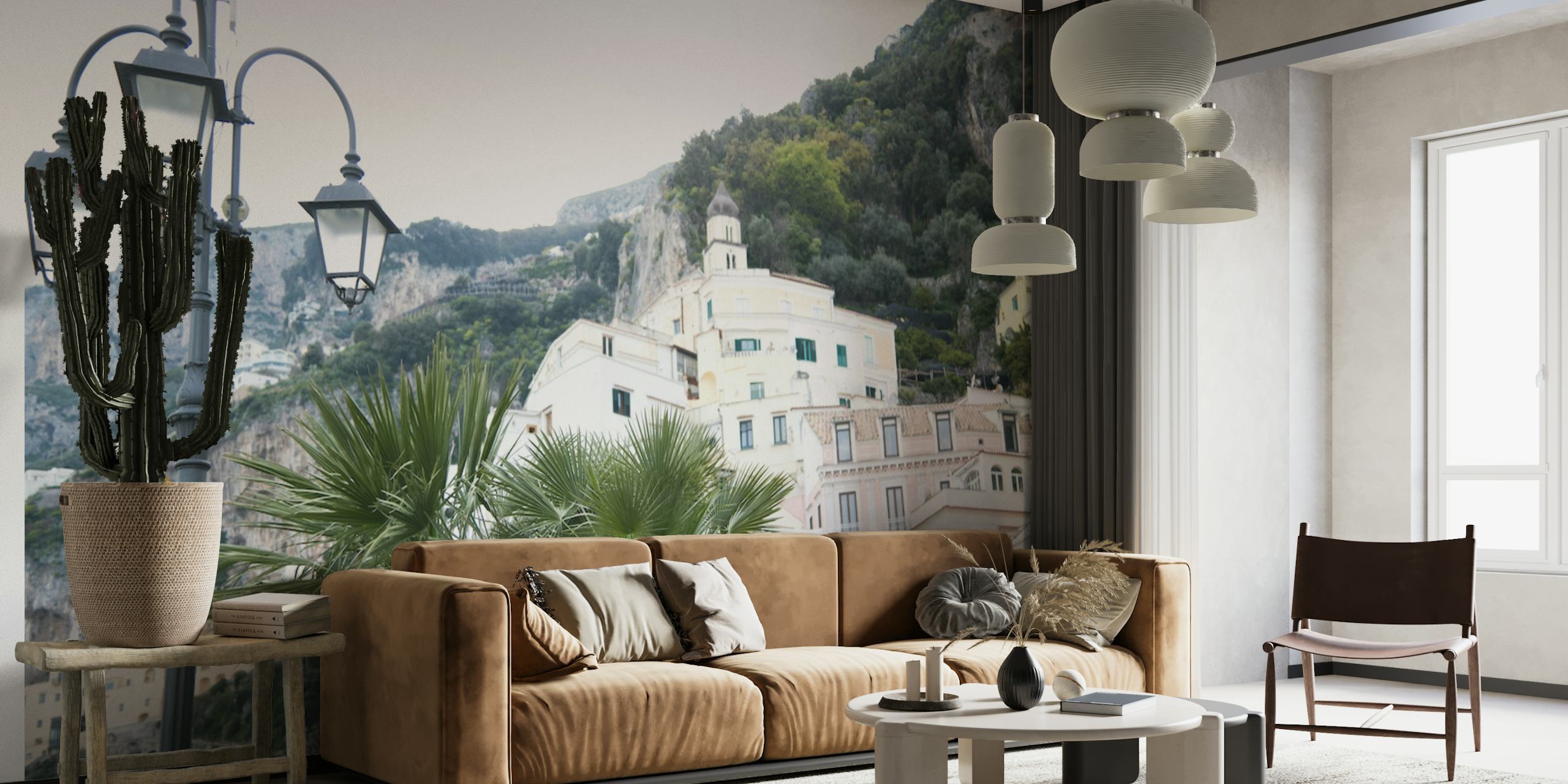 A scenic wall mural of the Amalfi coast with pastel buildings, greenery, and street lamps.