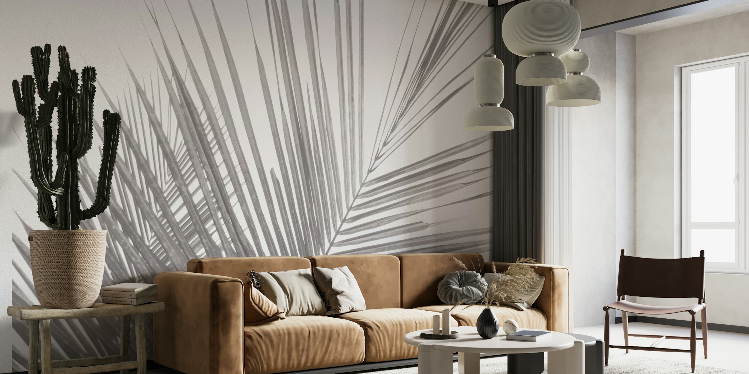 Monochrome tropical palm leaves wallpaper in a room