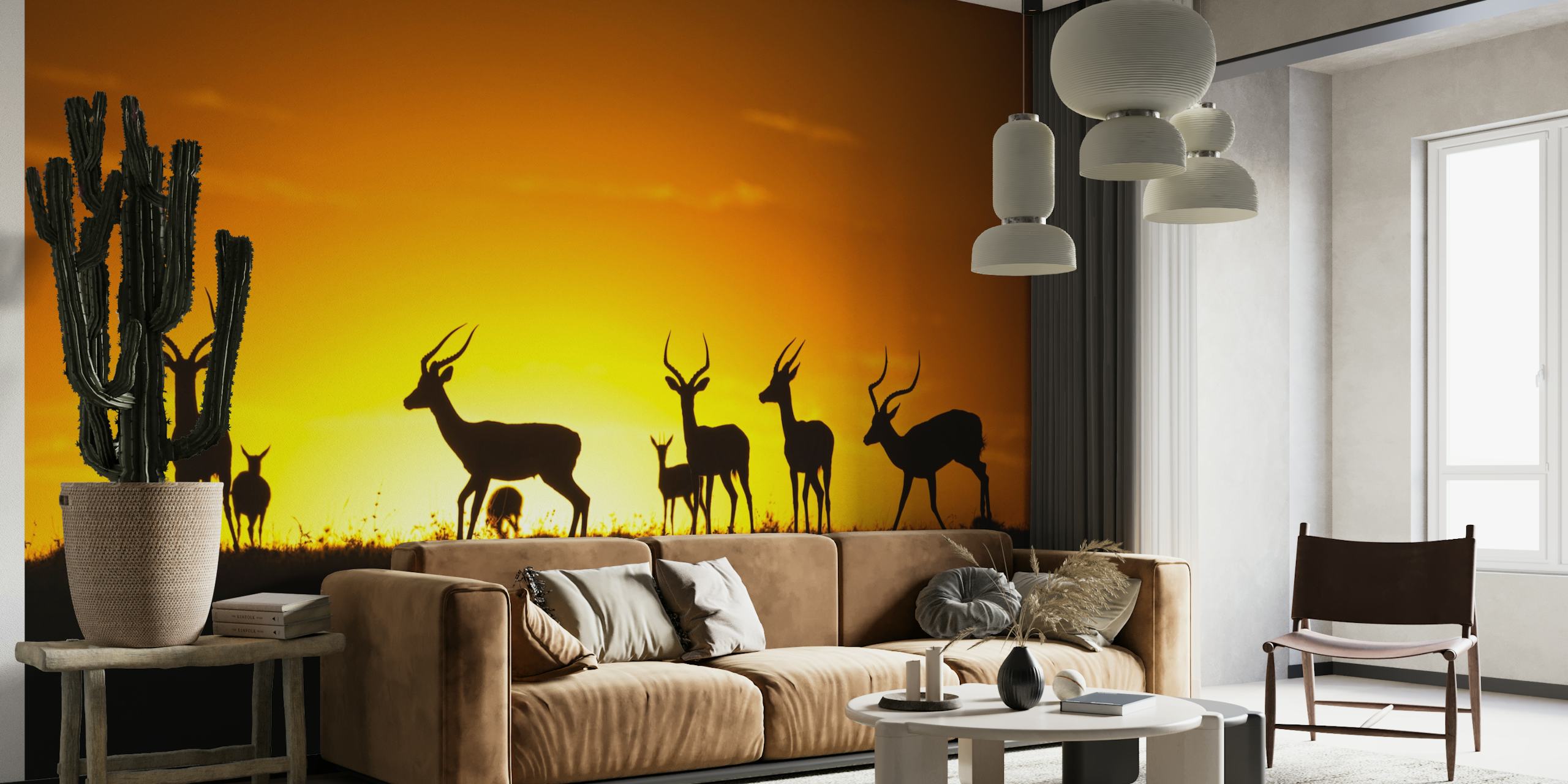 Silhouetted rådjur mot en solnedgång väggmålning