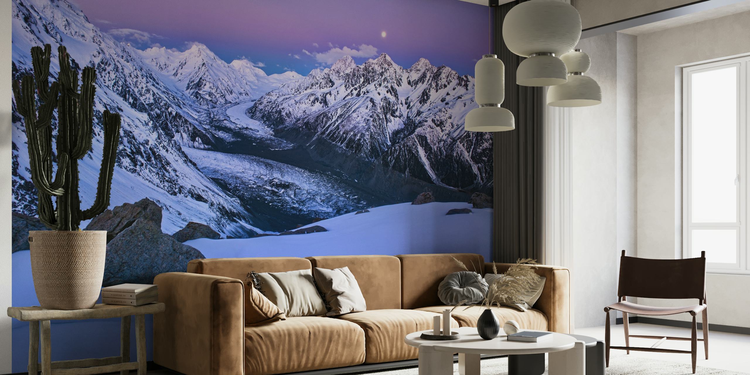 Snow-covered mountain peaks at twilight with a glowing moon wall mural