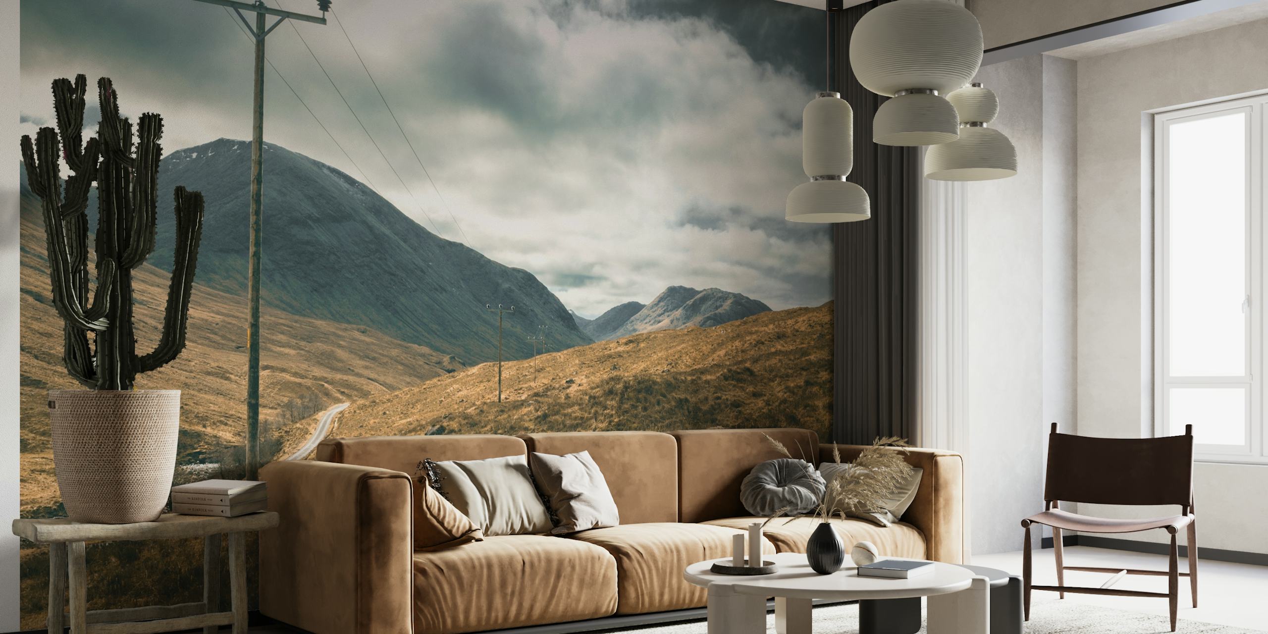 Winding road landscape in Scottish Highlands with gray clouds and mountains wallpaper