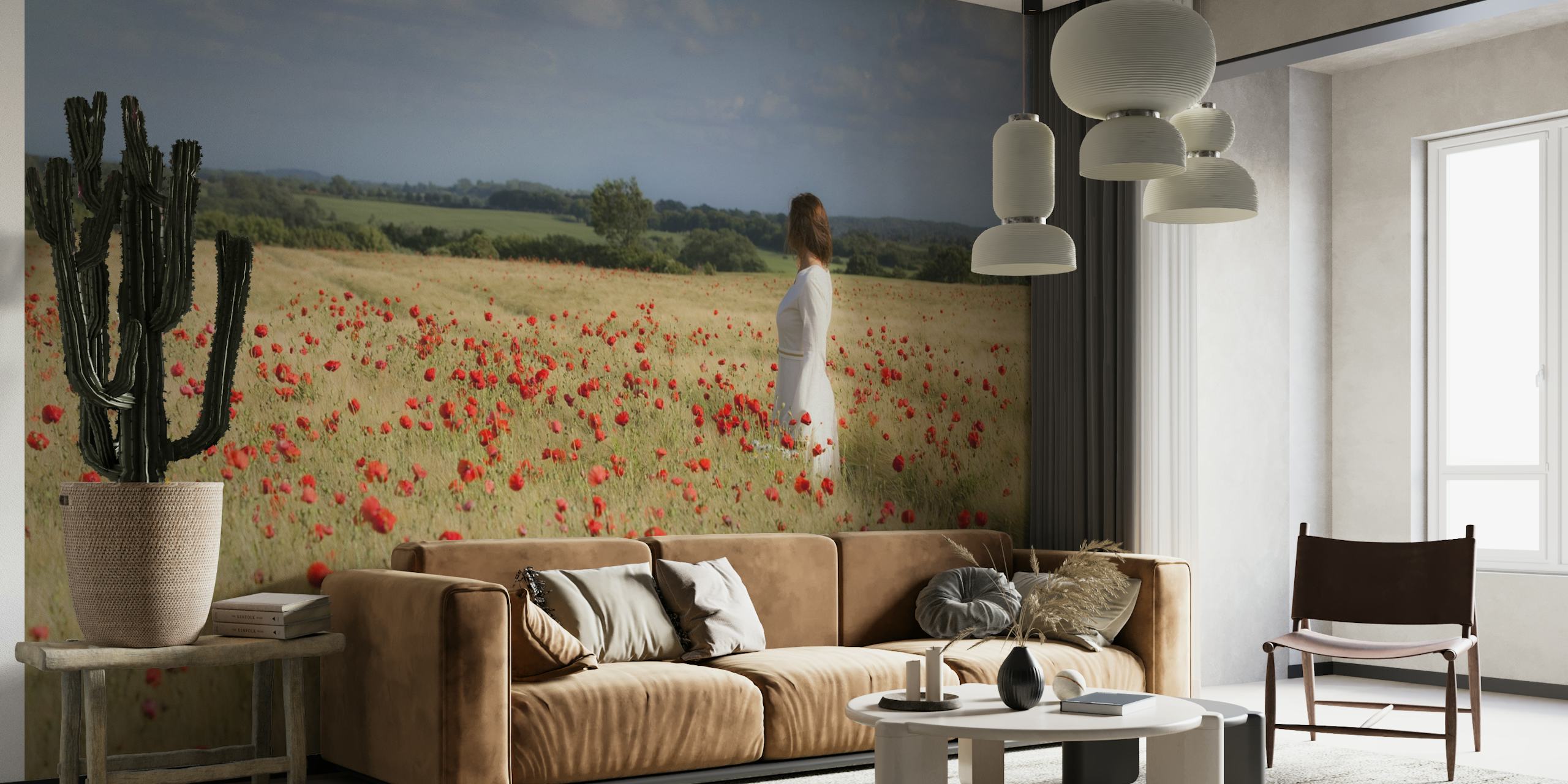 Person standing in a field of red poppies under a cloudy sky wall mural