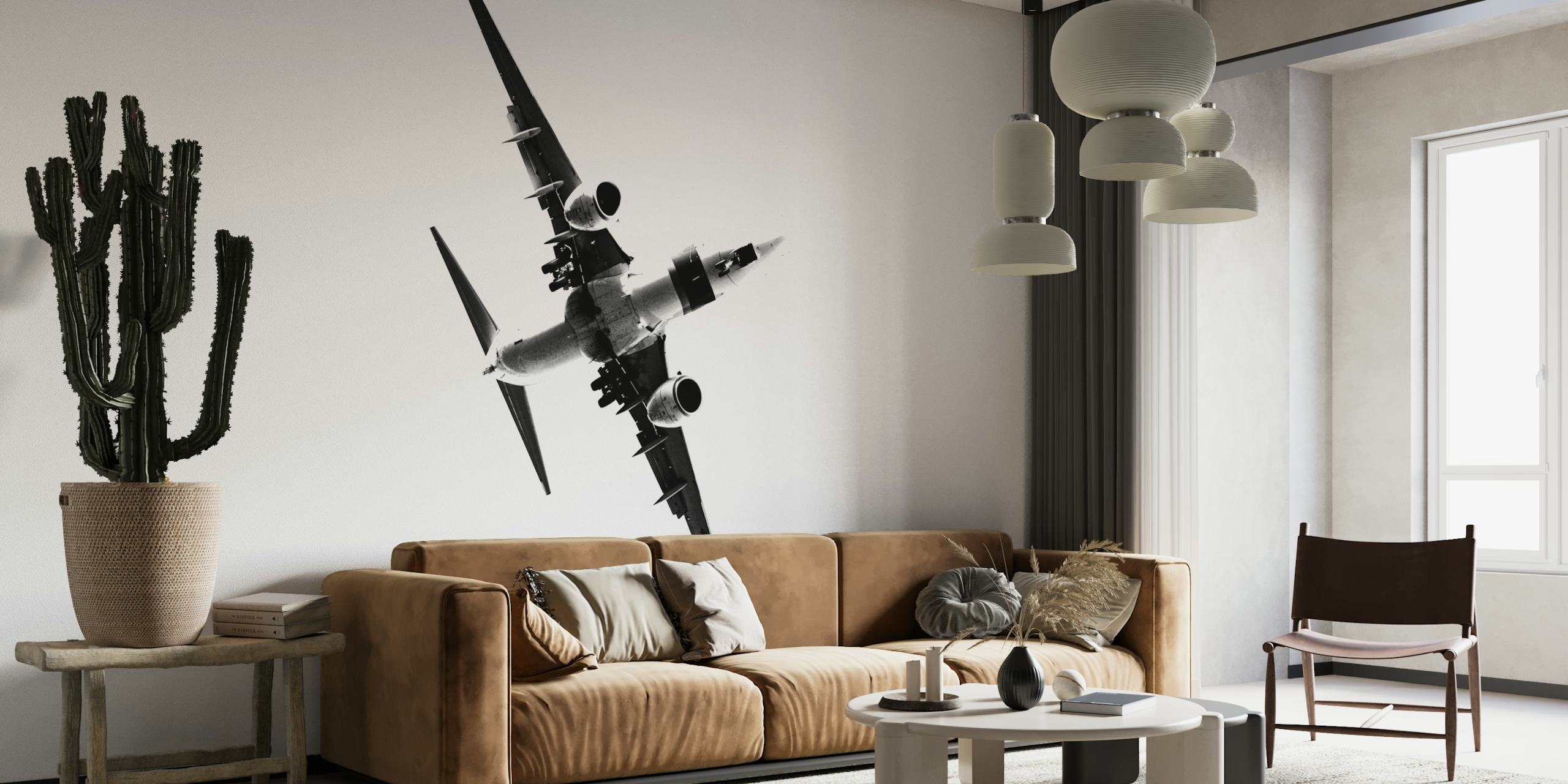 Mural en blanco y negro de un avión estilizado ascendiendo que simboliza el progreso y la ambición.