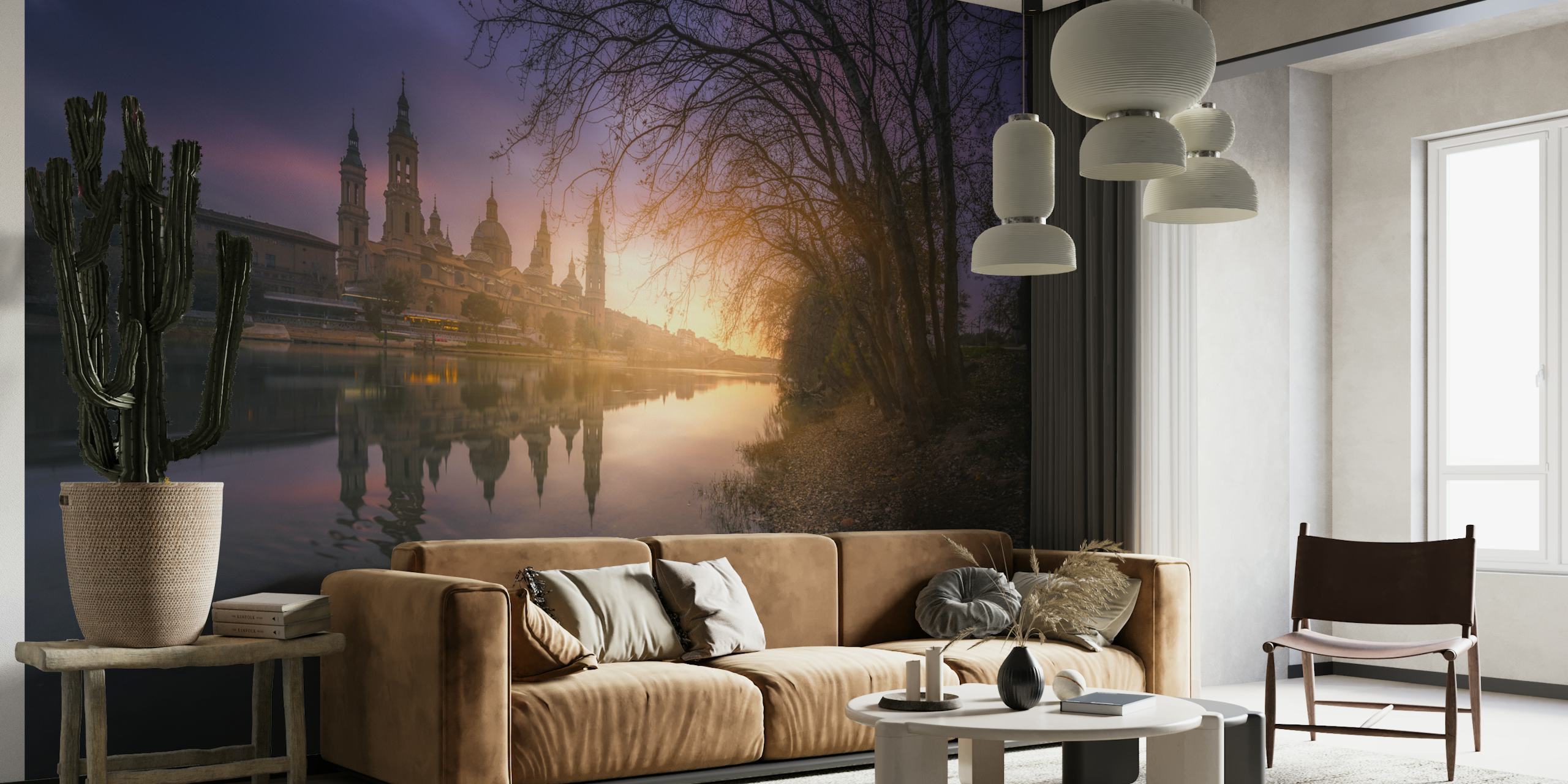 Sunset over a river with trees and buildings reflecting on water, landscape wallpaper