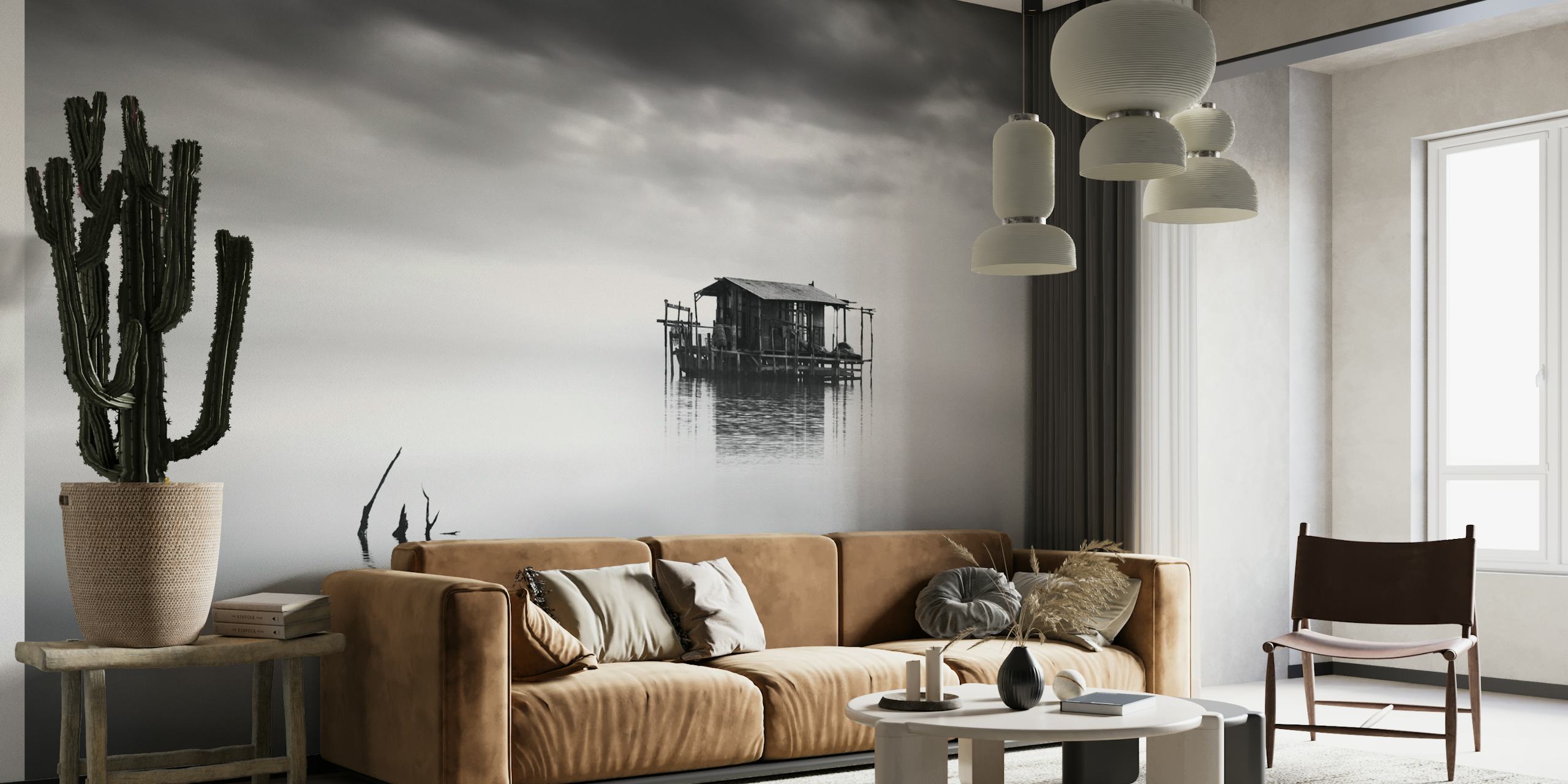 Surreal monochrome wall mural featuring an isolated structure surrounded by water