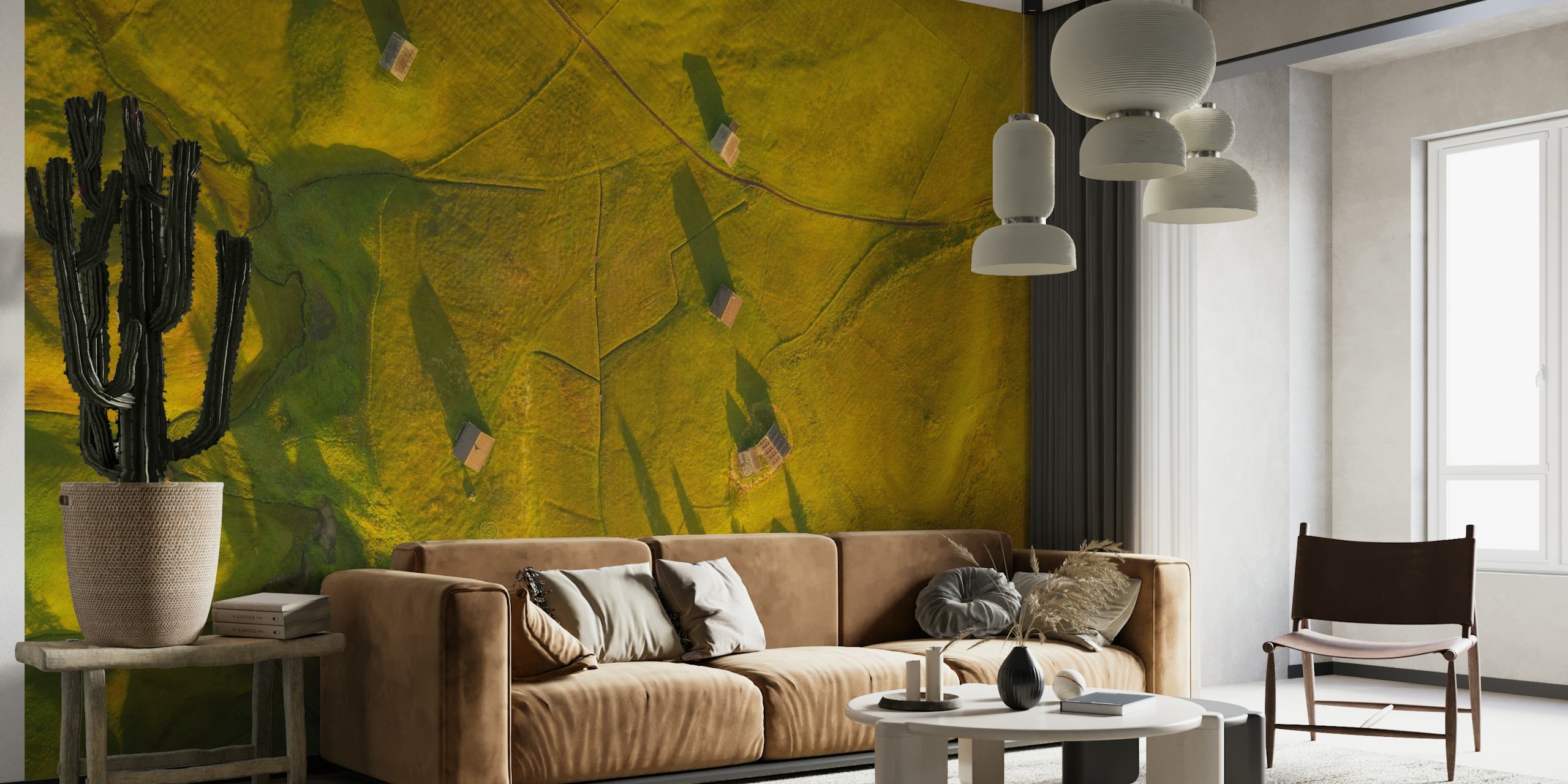 Aerial landscape wall mural with golden hues and shadowy patterns resembling birds in flight