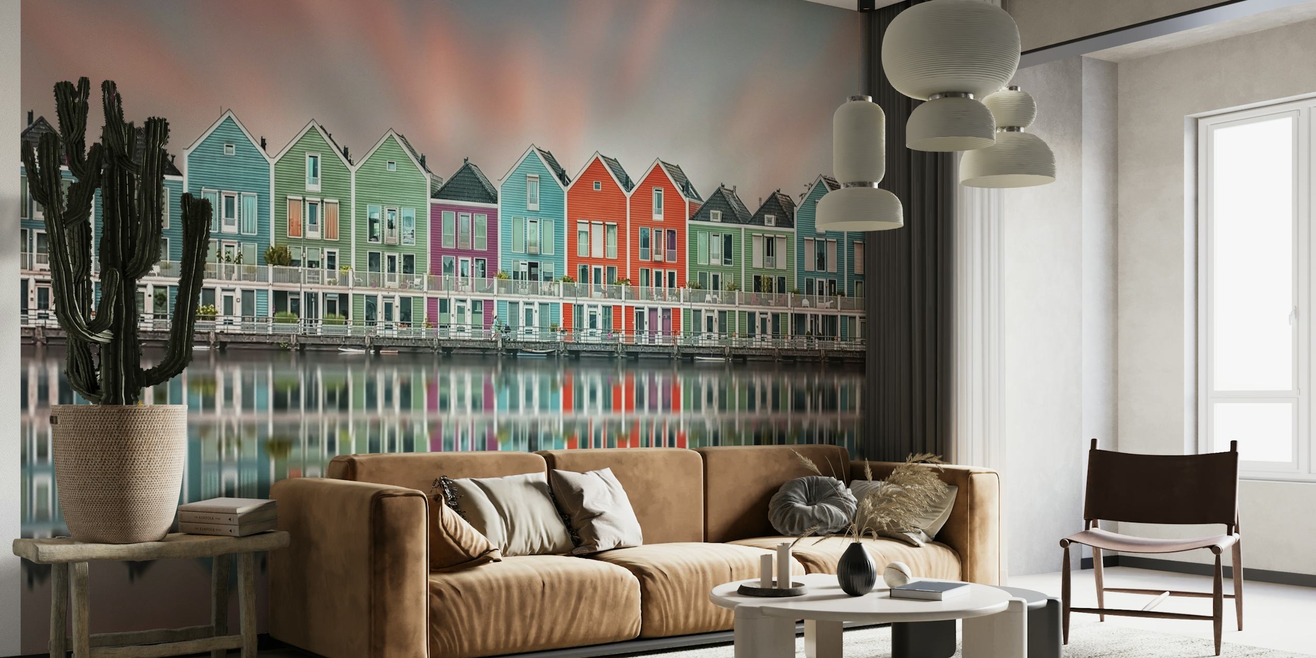 Värikkäitä taloja rantaheijastuksen seinämaalaus