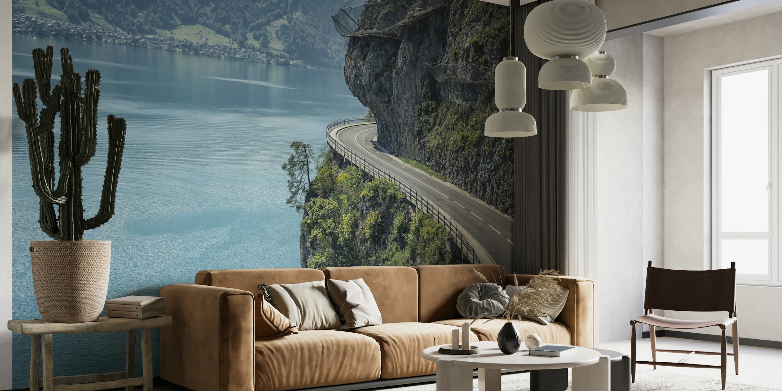 Winding mountain road with scenic lake view wall mural