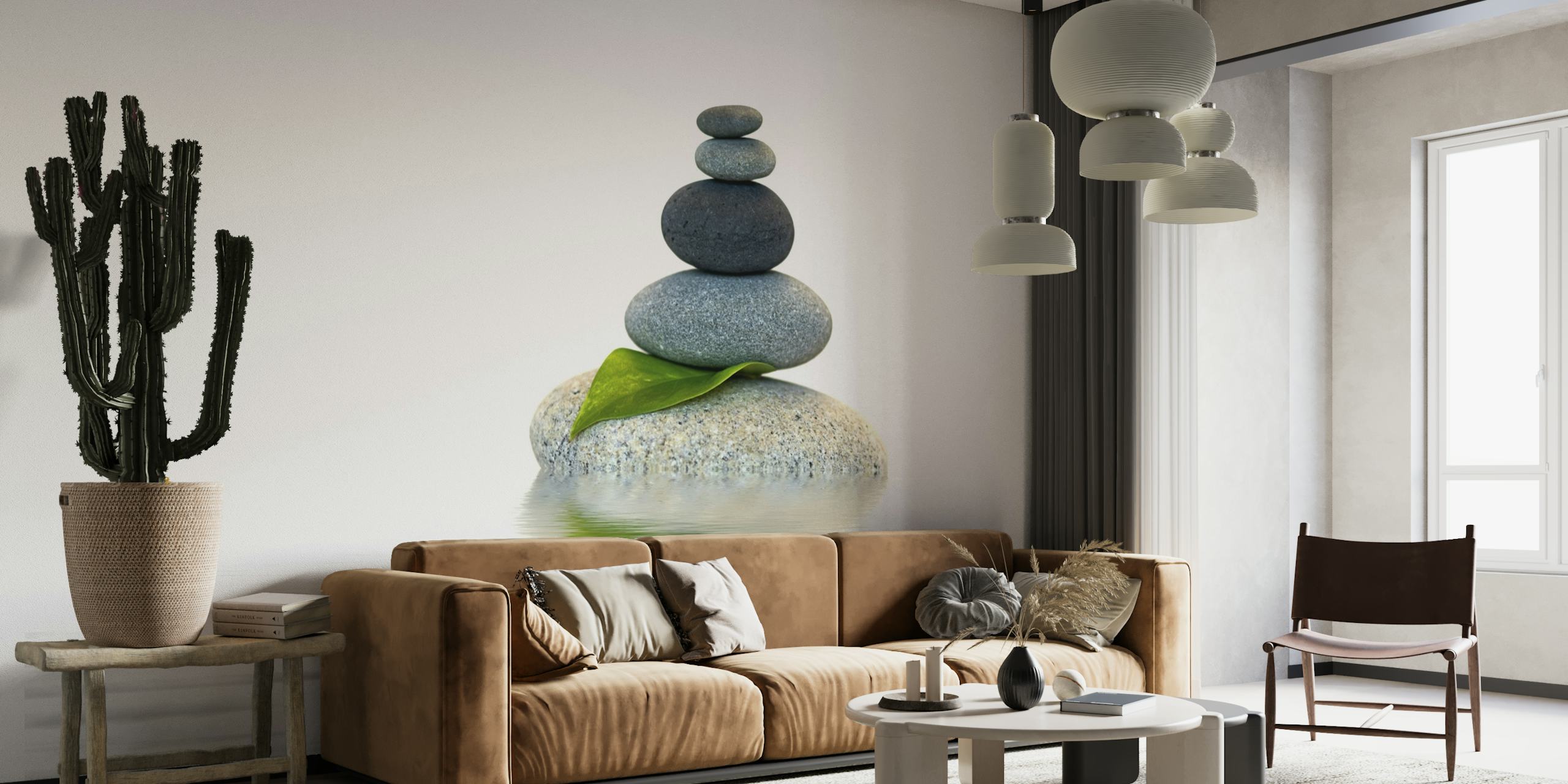 Zen stone stack s nástěnnou malbou listů na pozadí klidné vody