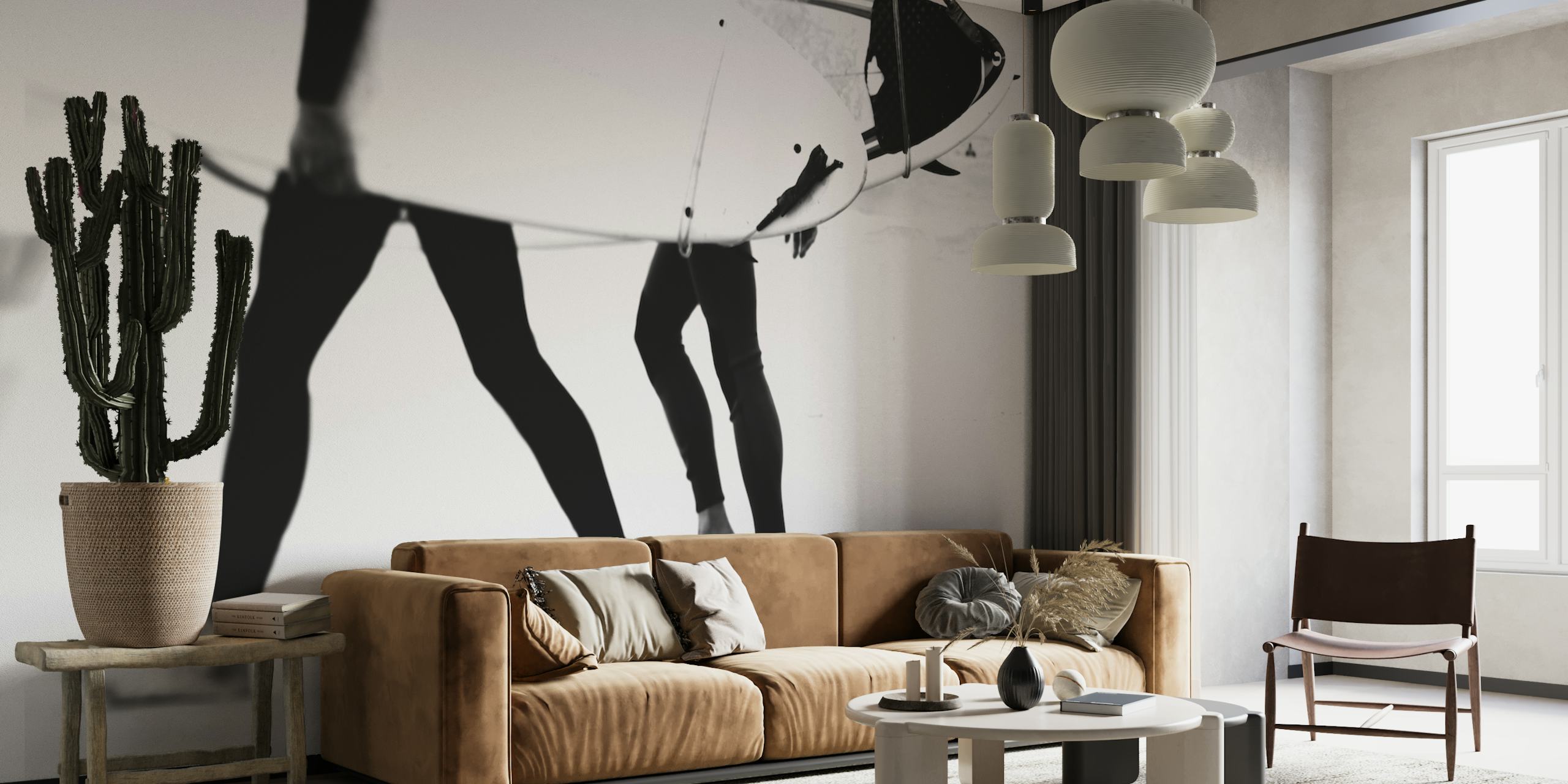 Two surfers walking on the beach carrying surfboards black and white wallpaper