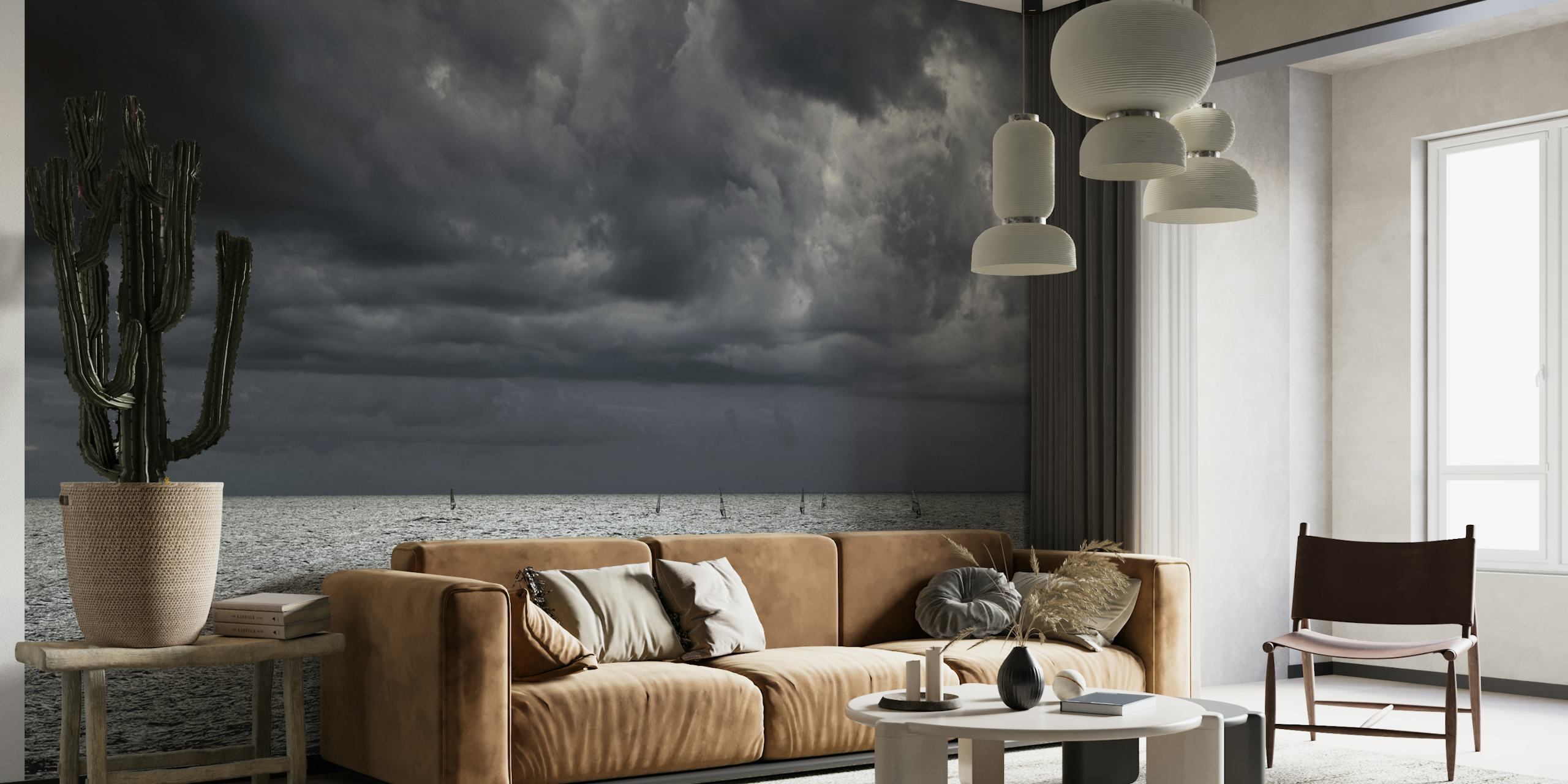 Moody seascape with cloudy sky over a shimmering ocean wall mural