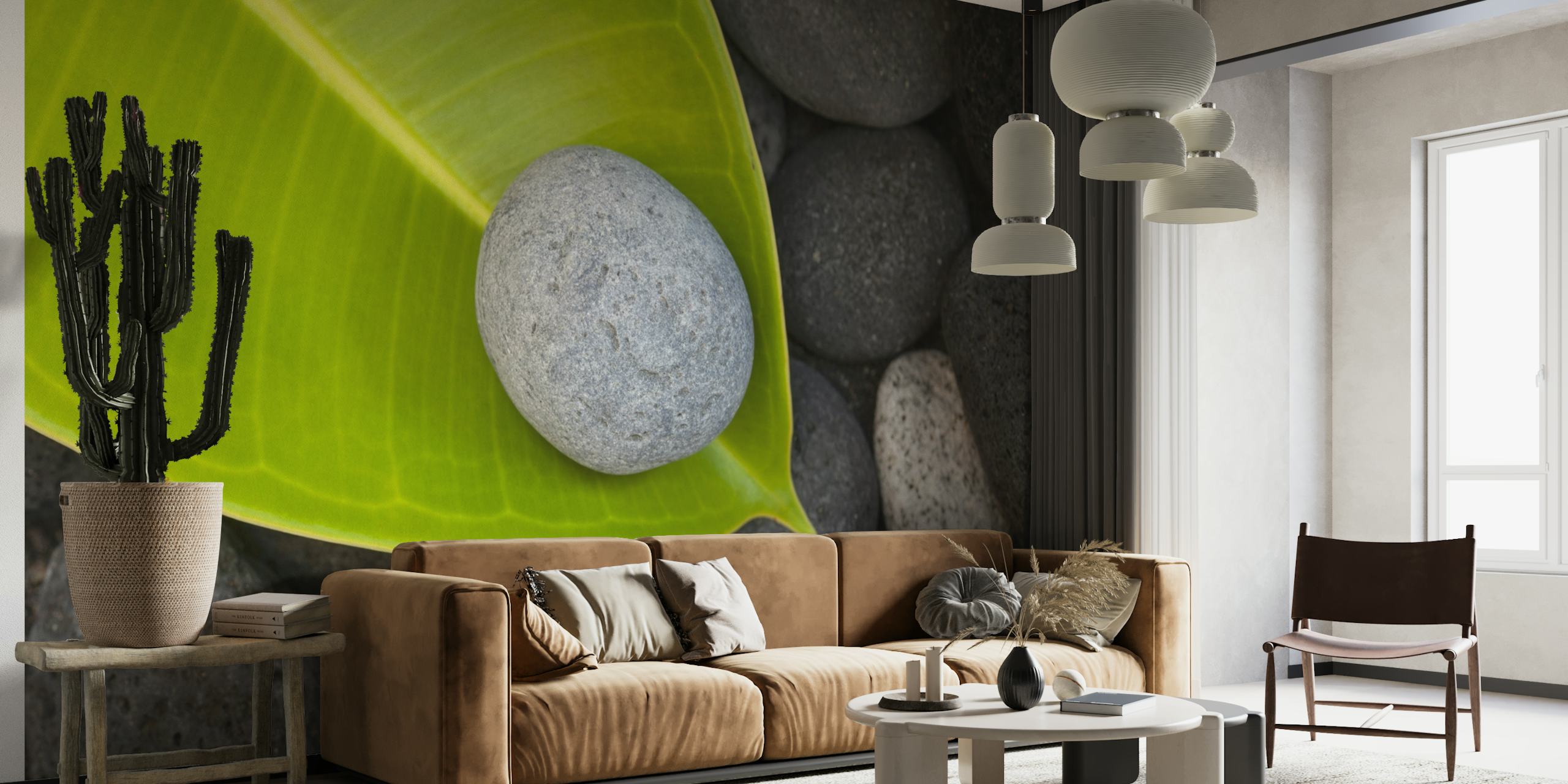 Zen-inspired wall mural featuring a green leaf and smooth pebbles
