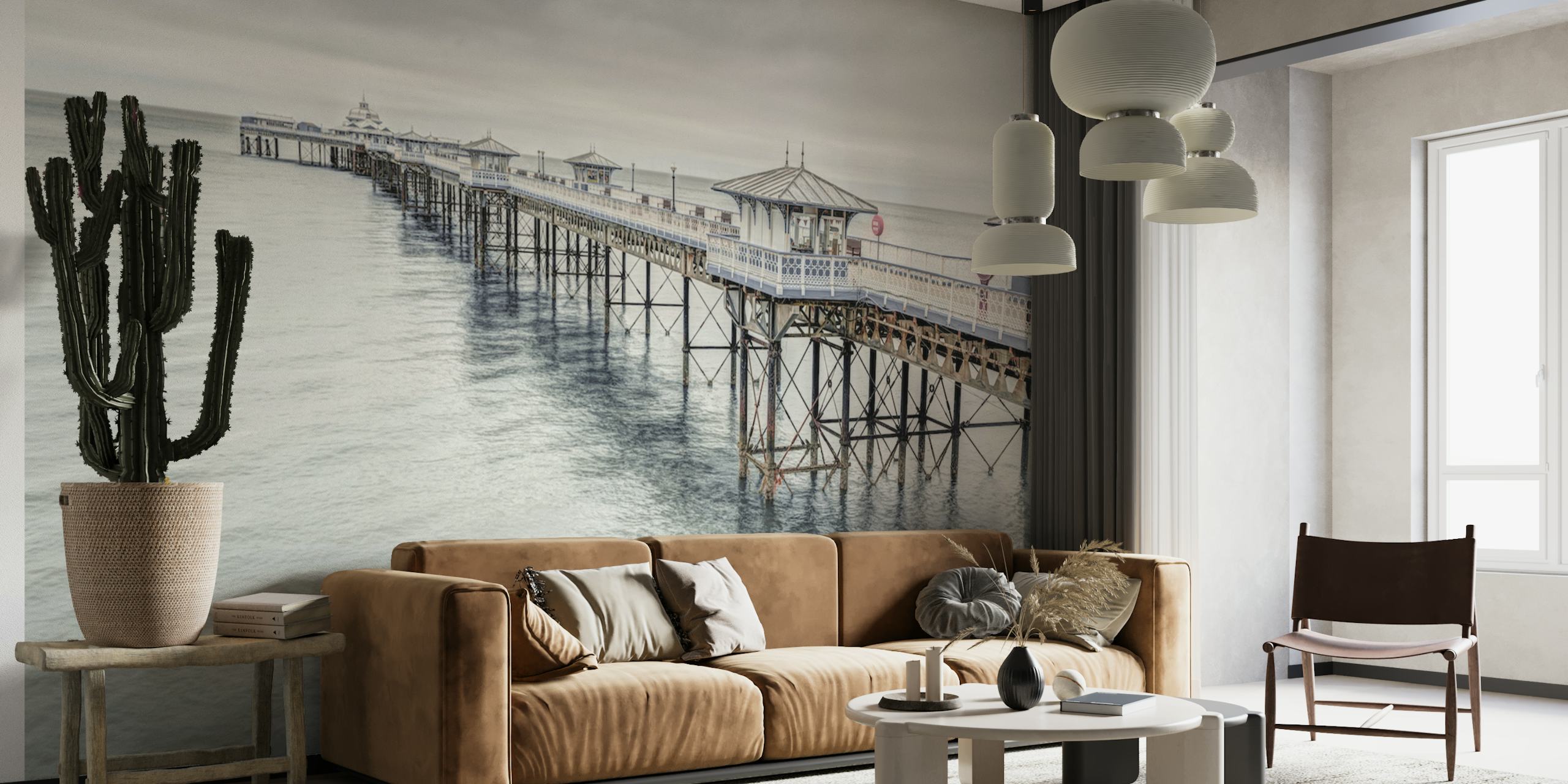 Coastal landscape wallpaper featuring Llandudno pier in muted greys and blues, realistic photography style.