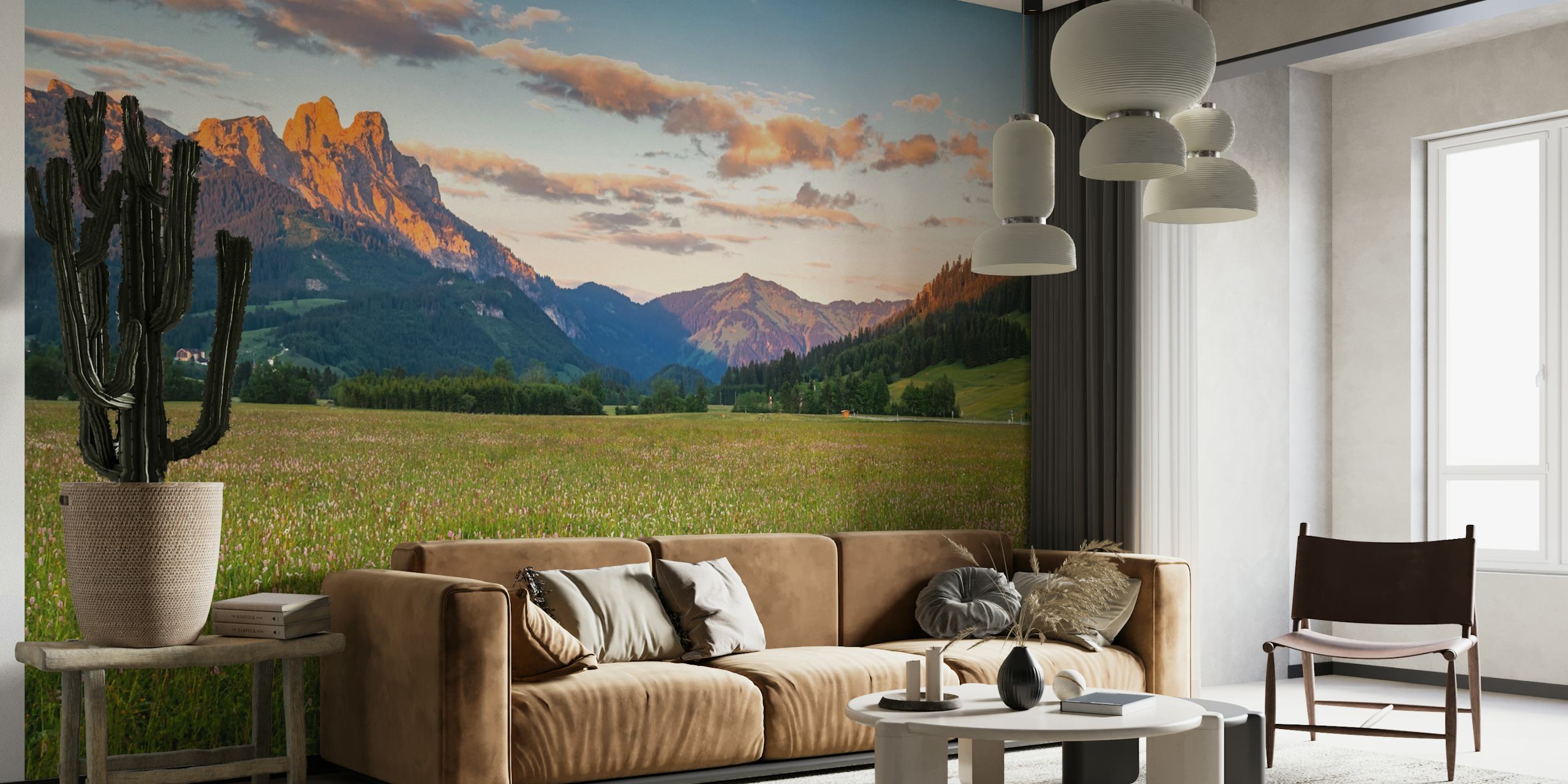 Scenic mountain view with green fields and blue sky wallpaper