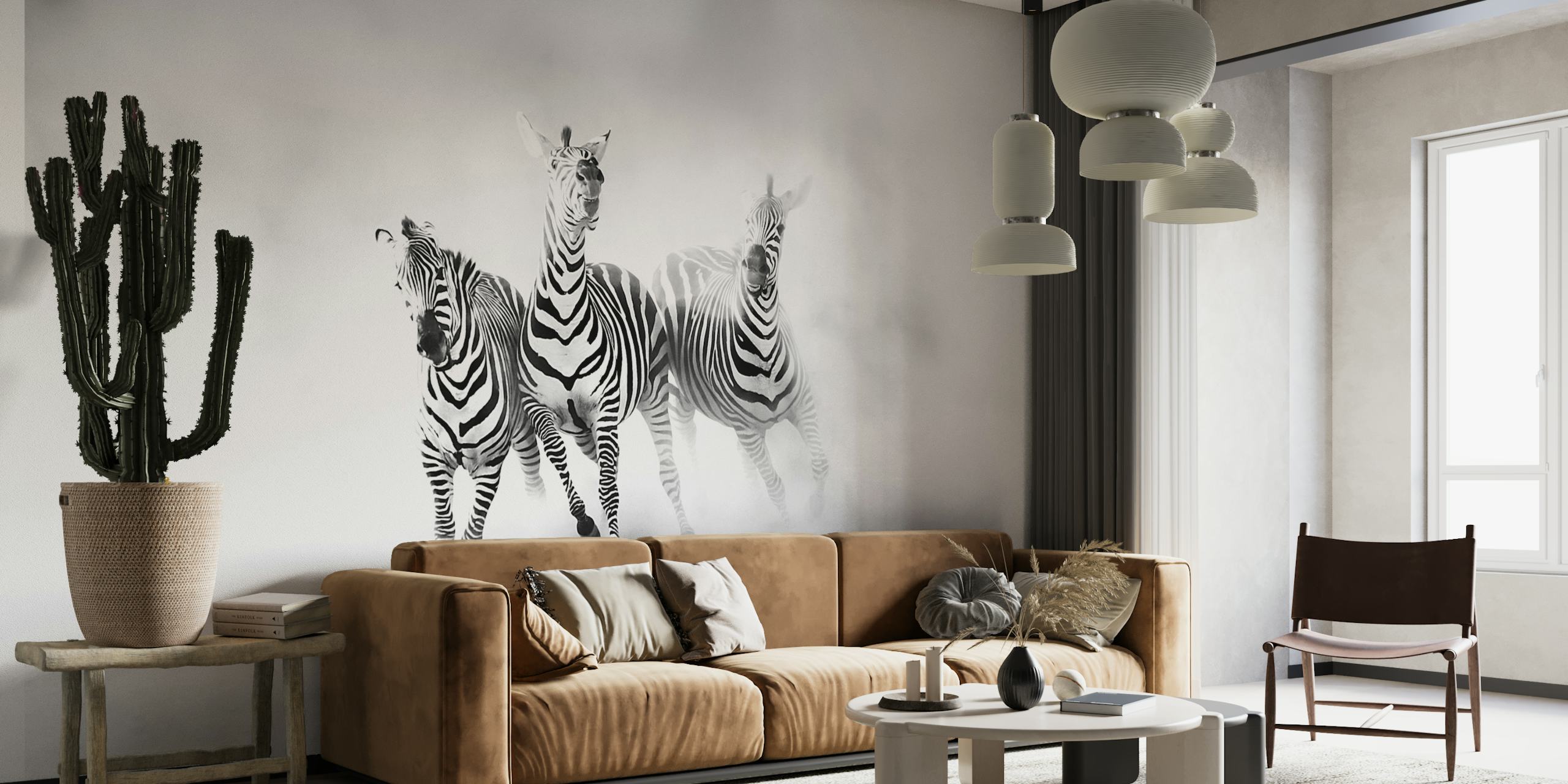 Black and white wall mural of zebras in motion