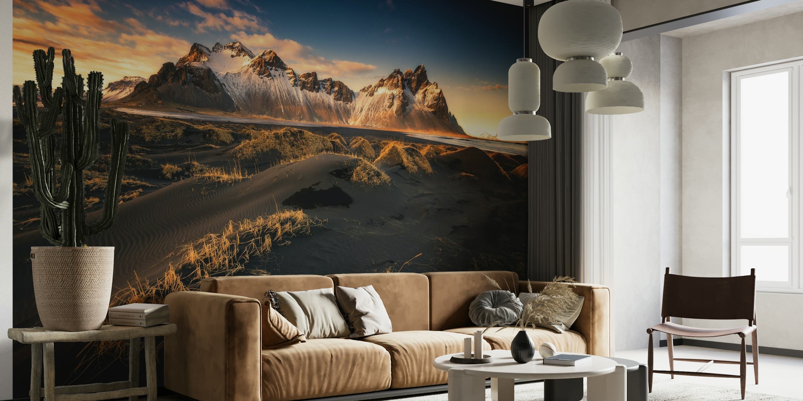 Icelandic landscape with snow-capped mountains and golden sunset hues wall mural