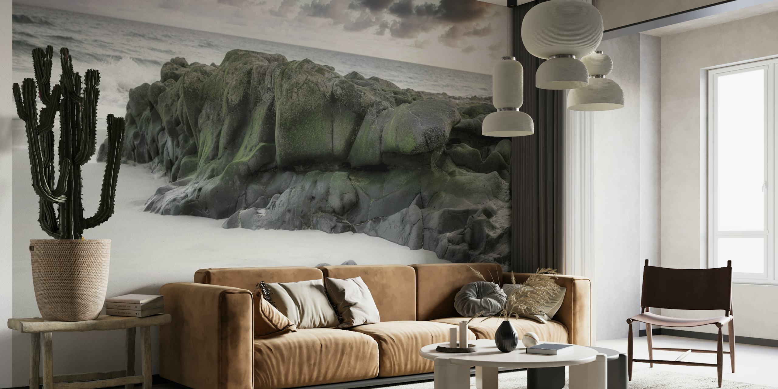 Tranquil beach scene with rocks wall mural