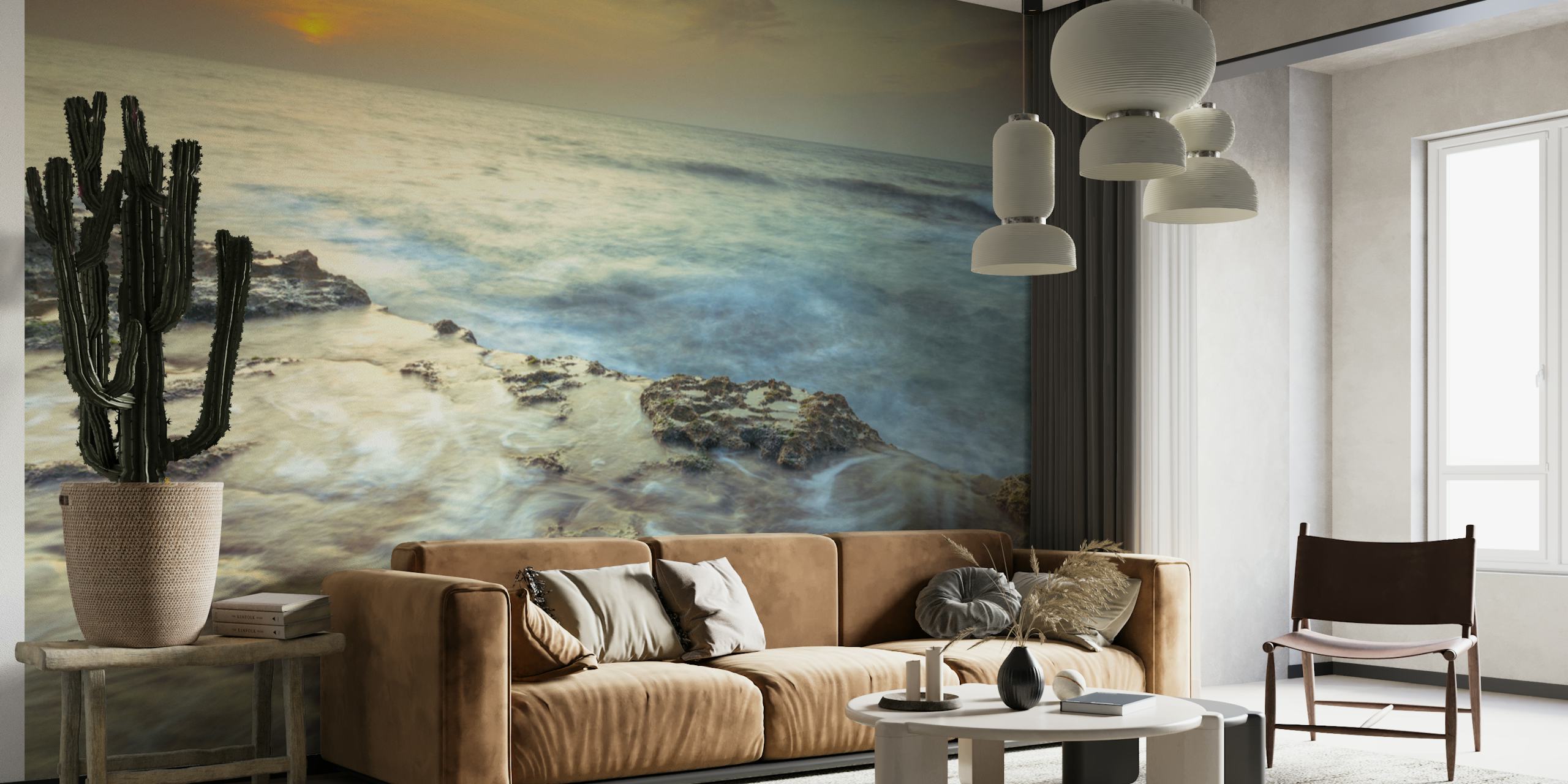 Ocean sunset with waves crashing on rocky shore wallpaper