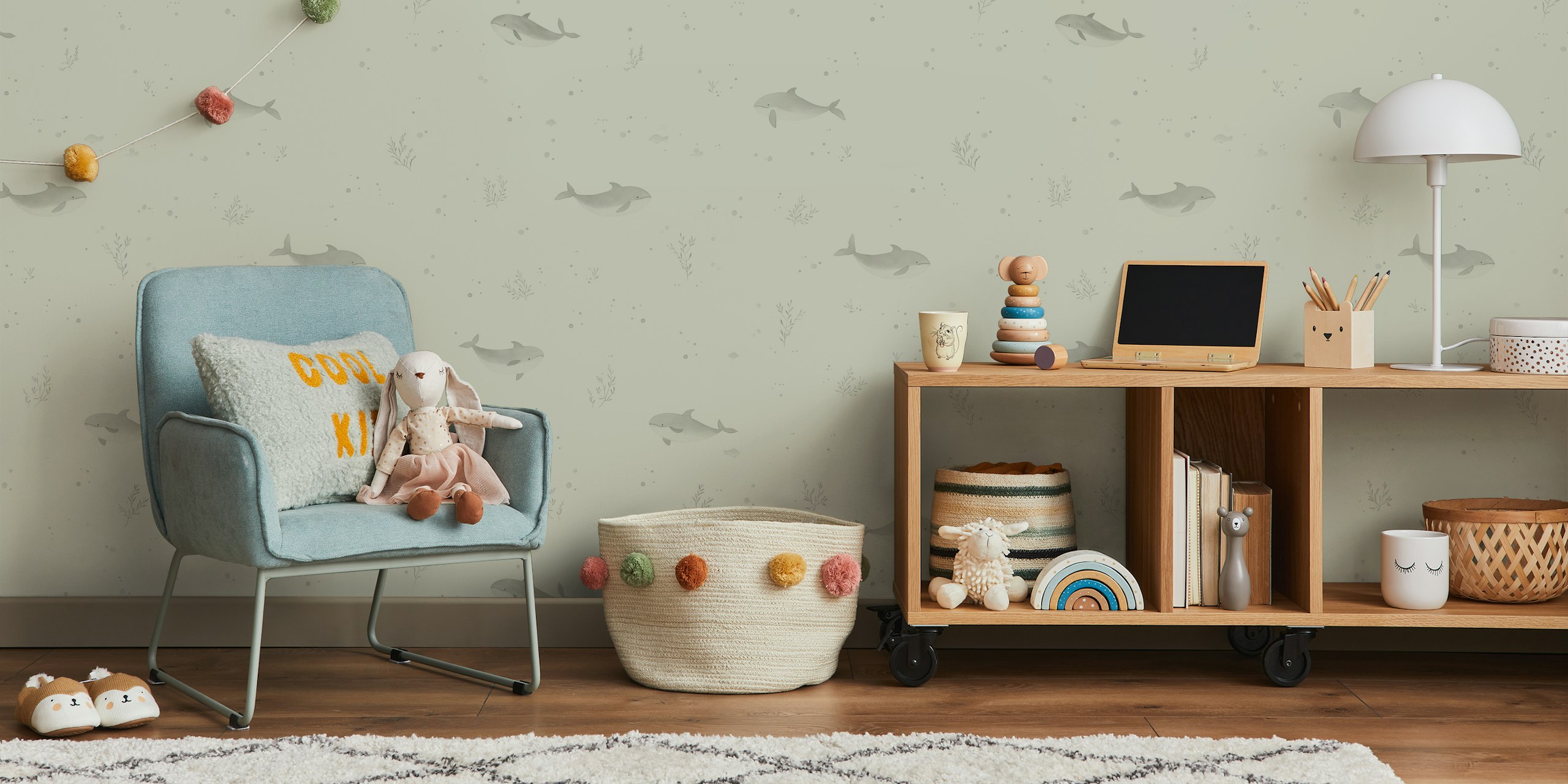 Seafoam green wallpaper with dolphins and seaweed motifs