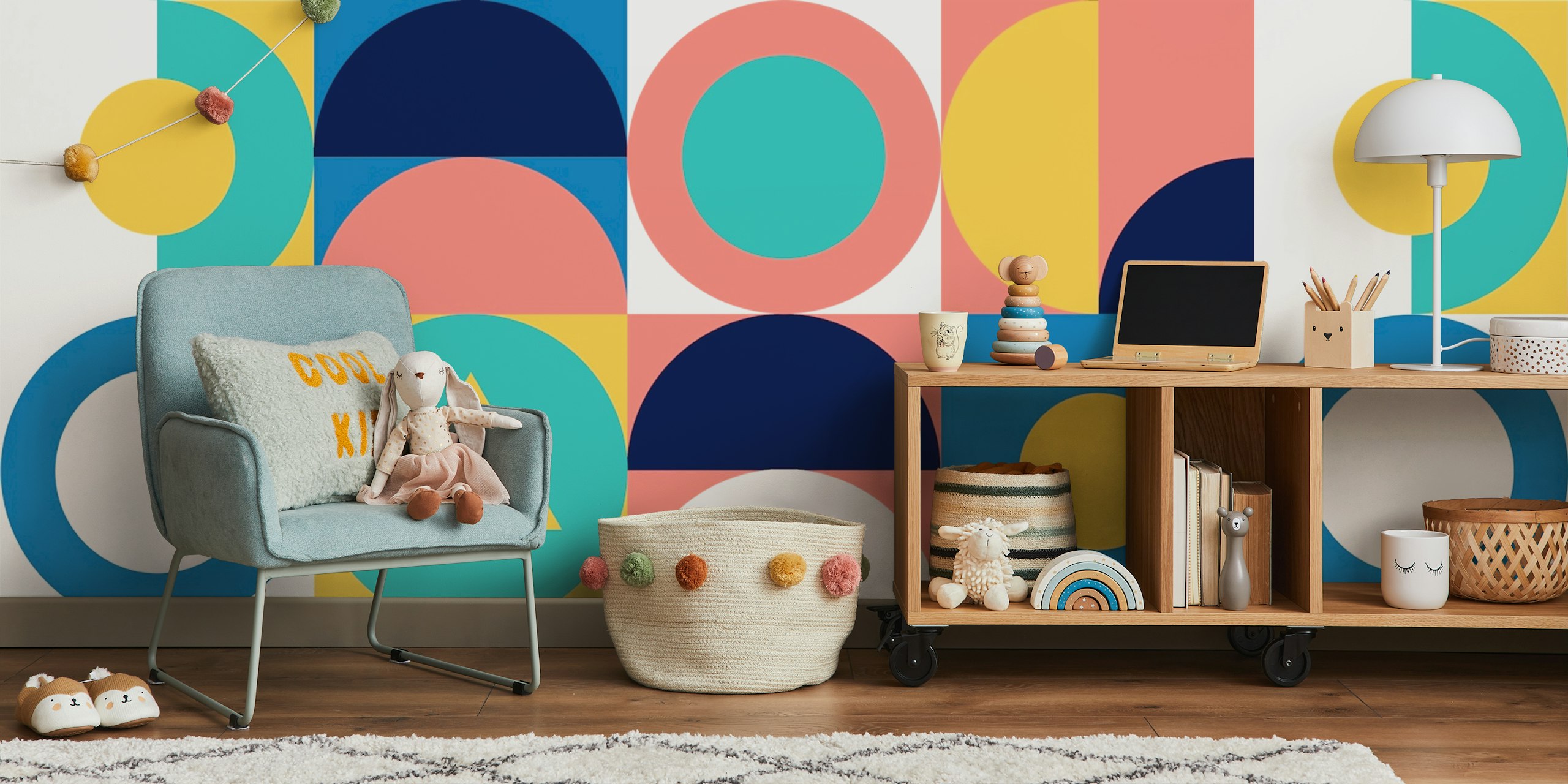 Colorful geometric shapes in blue, pink, and yellow wallpaper