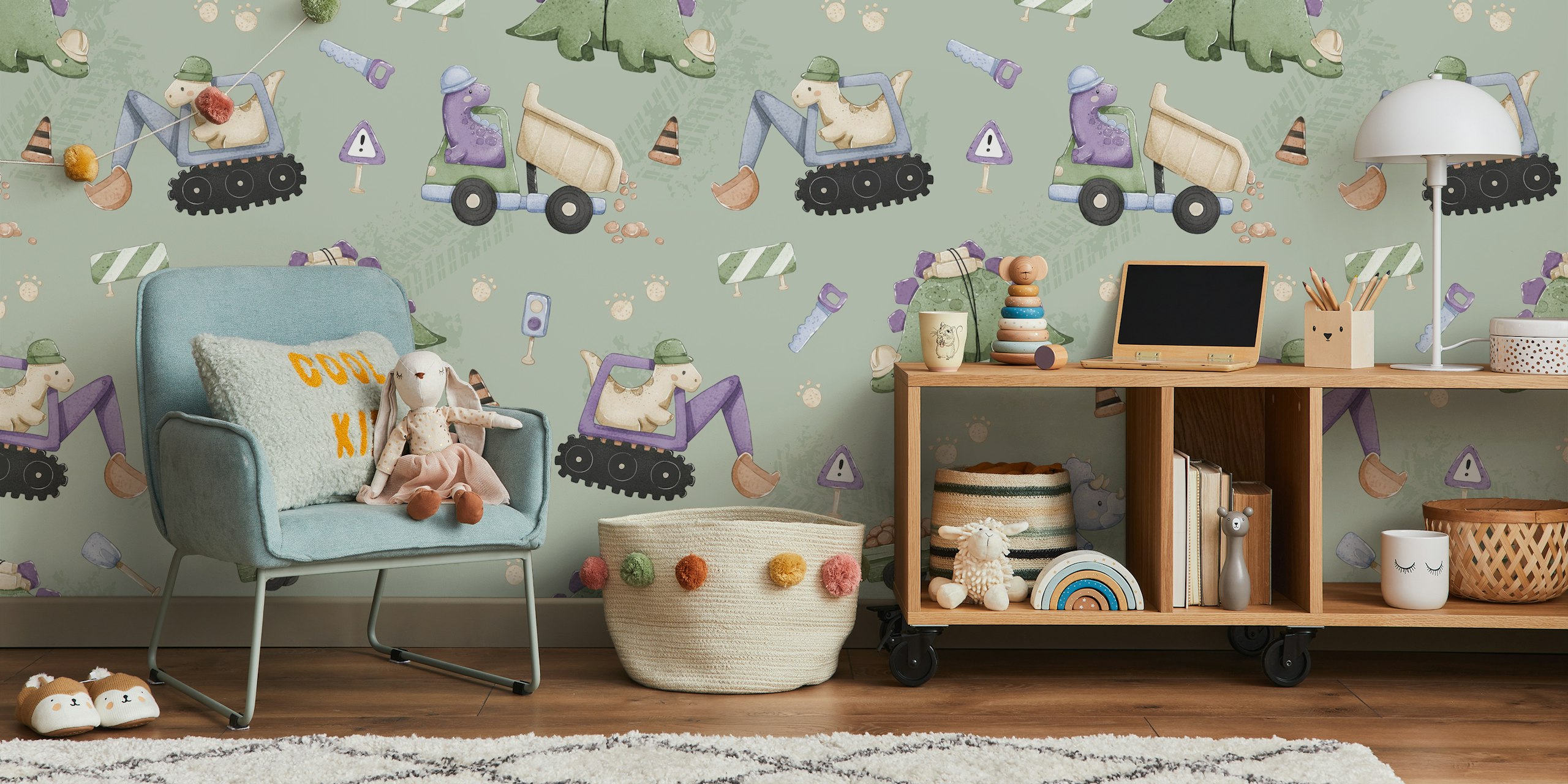 Dinosaur construction vehicles and dinosaurs on sage green wallpaper