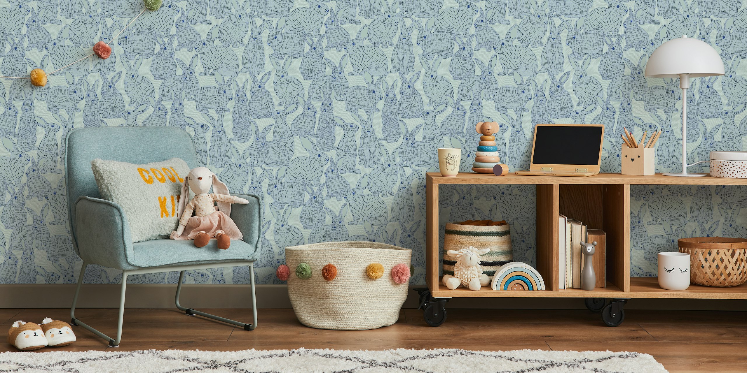 Dotted rabbits blue wallpaper in a room