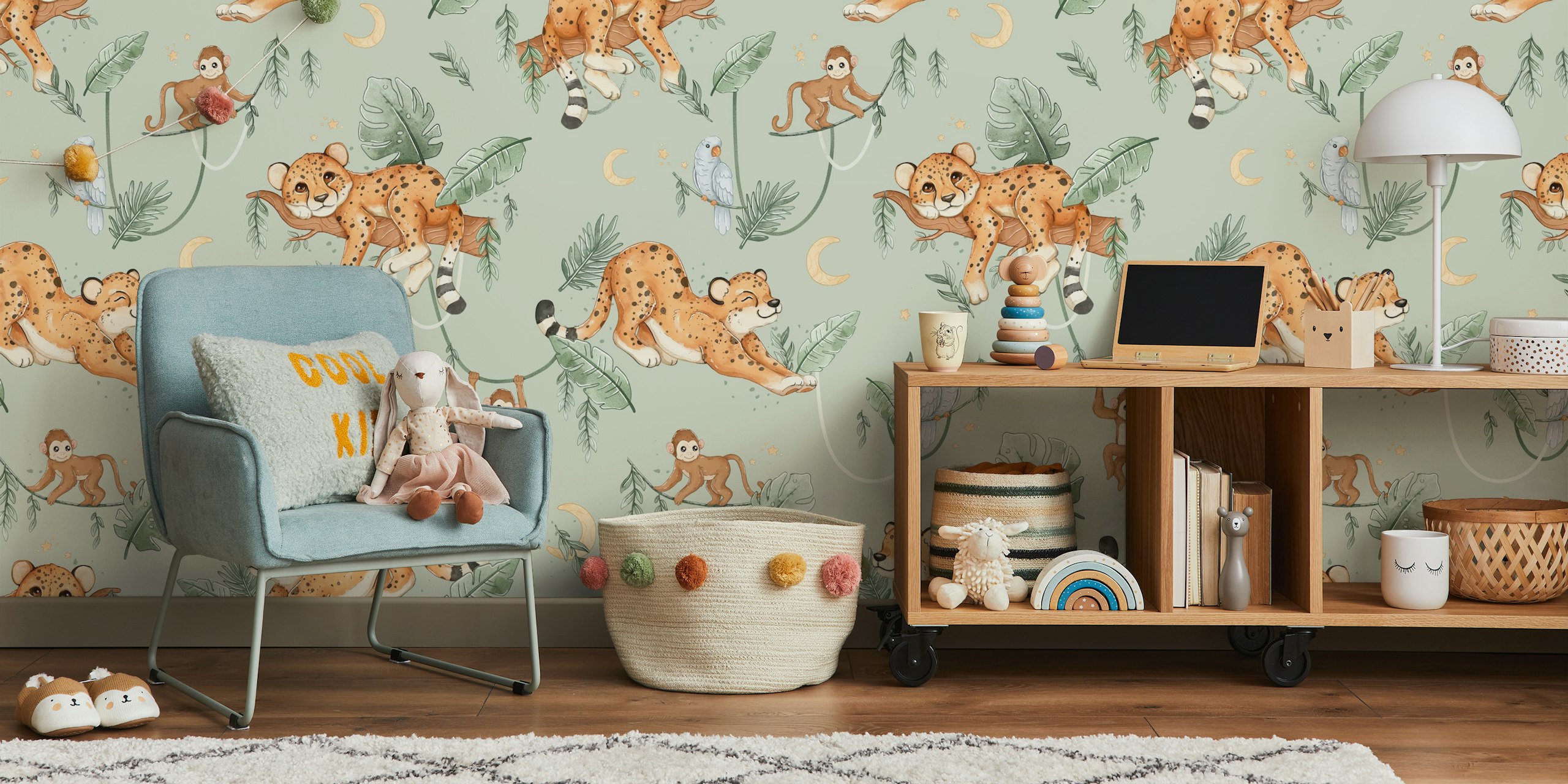 Leopards, monkeys, and birds with green leaves on mint green wallpaper.