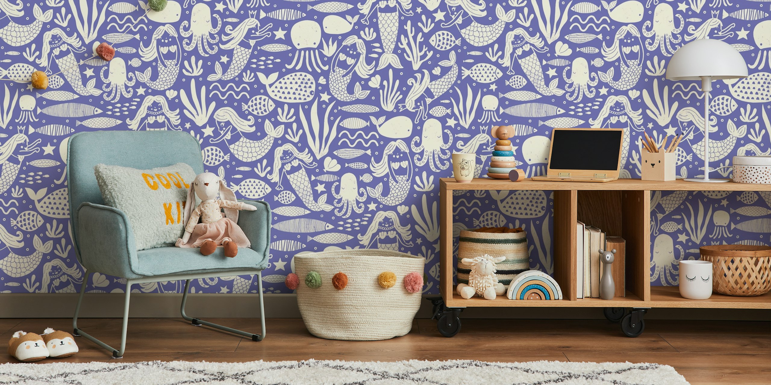 Underwater mermaids and sea life wallpaper in room
