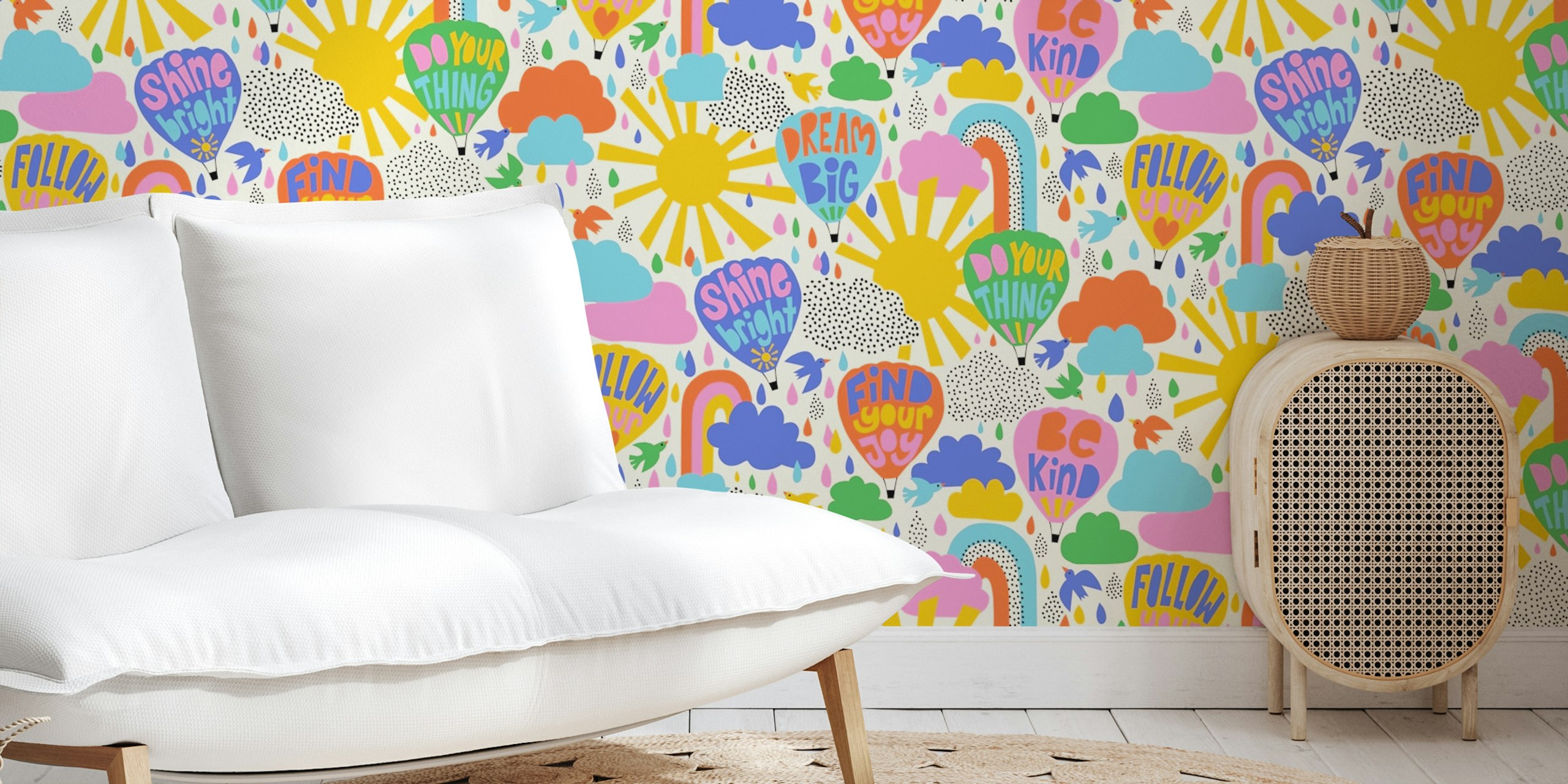 Colorful hot air balloons and cheerful messages in pink, blue, yellow on cream wallpaper