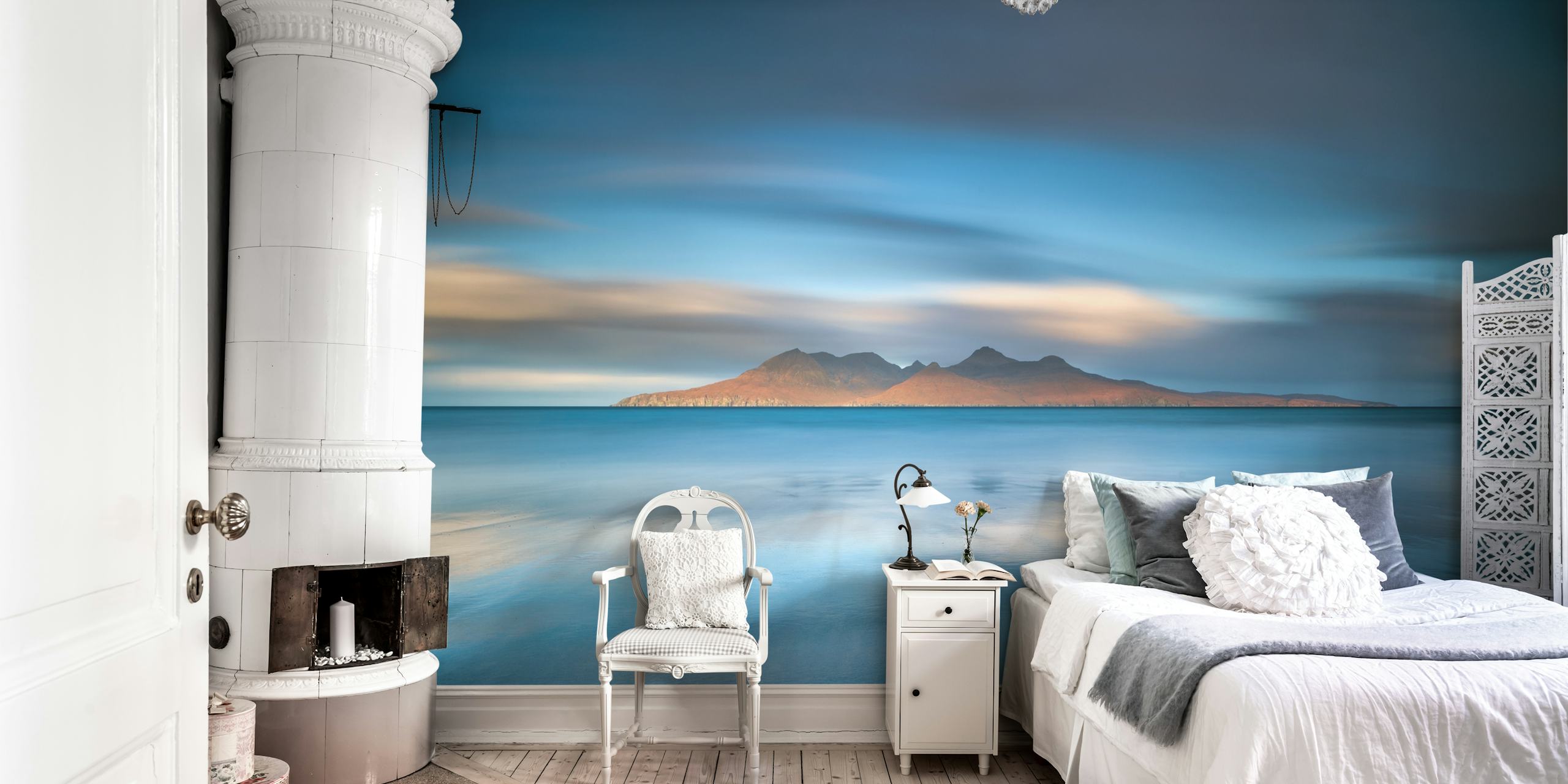 Epic sunrise over the ocean and island, blue tones wallpaper
