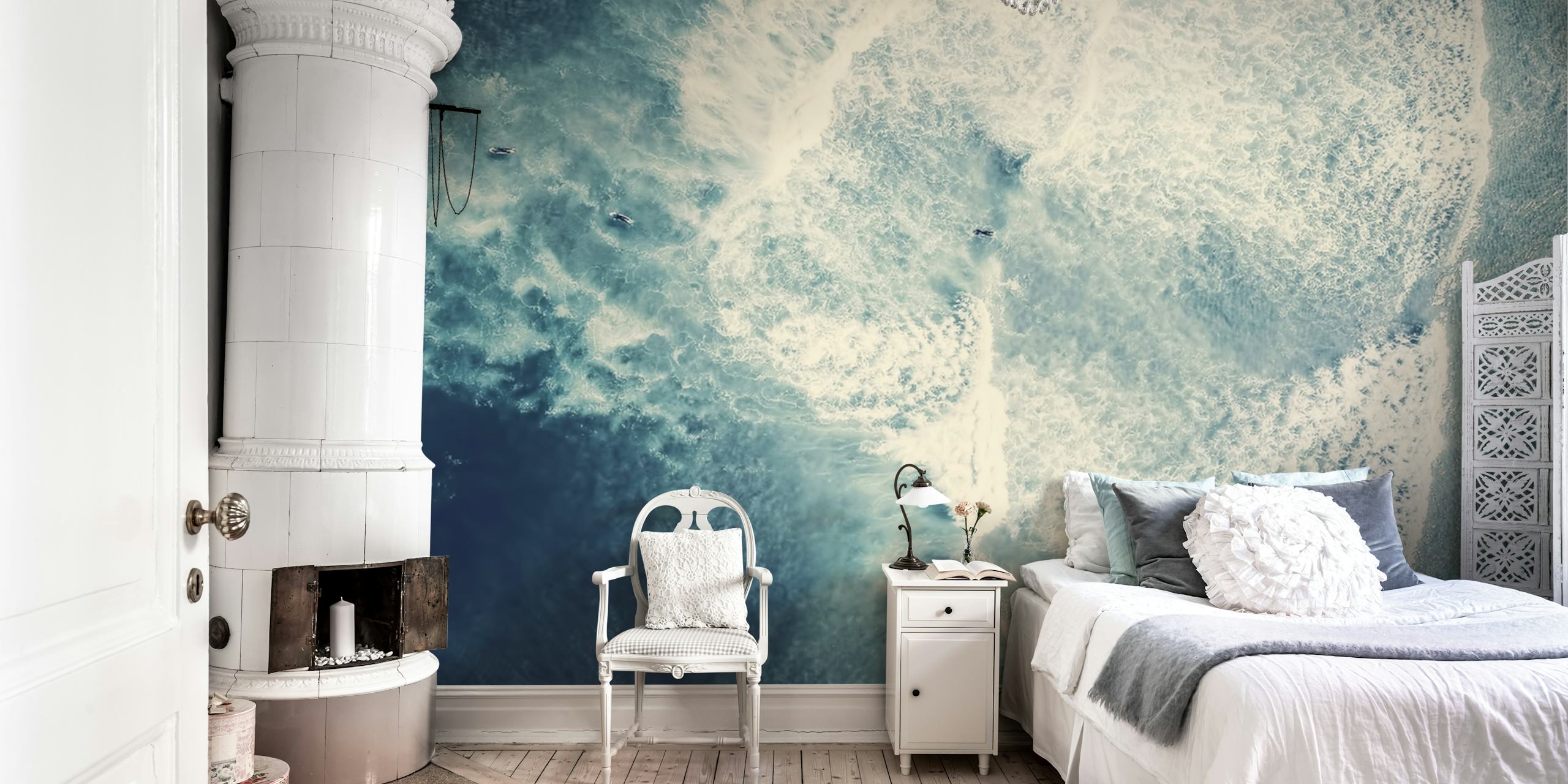 Ocean waves with surfers in blue and white wallpaper