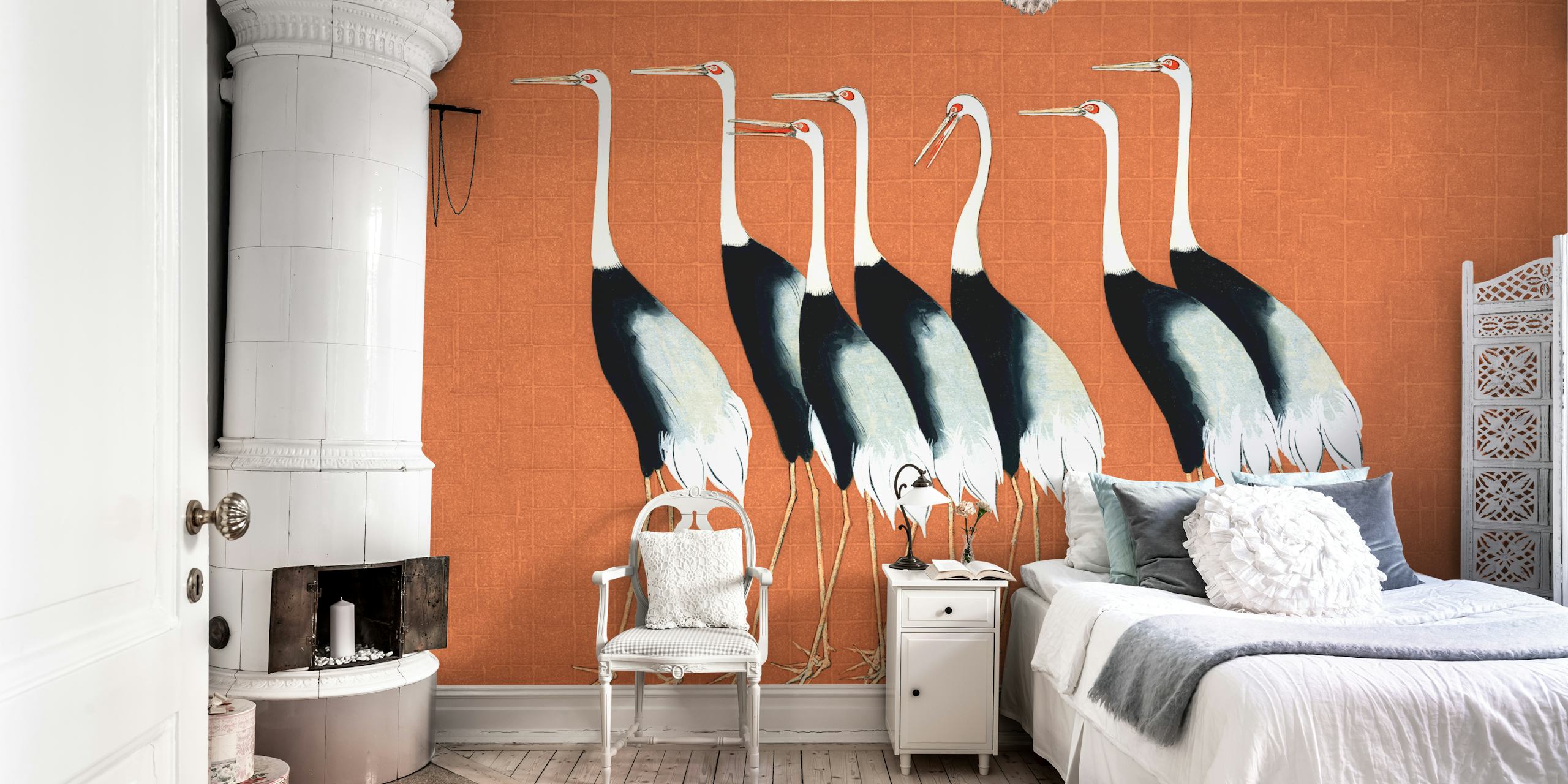 Graceful Japanese cranes standing against a warm terracotta background in modern wall mural design.