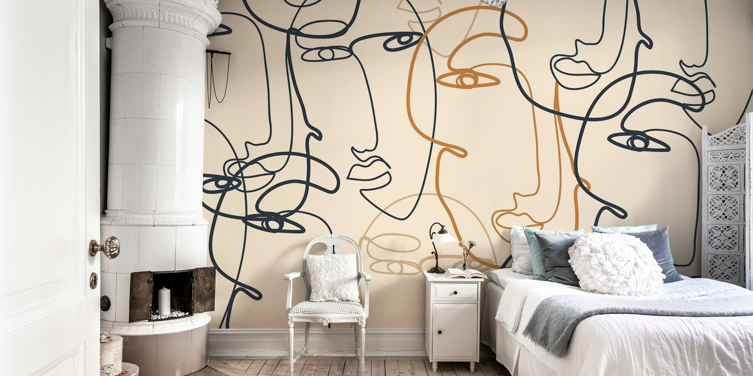 Continuous line art of faces in black, orange on beige wallpaper