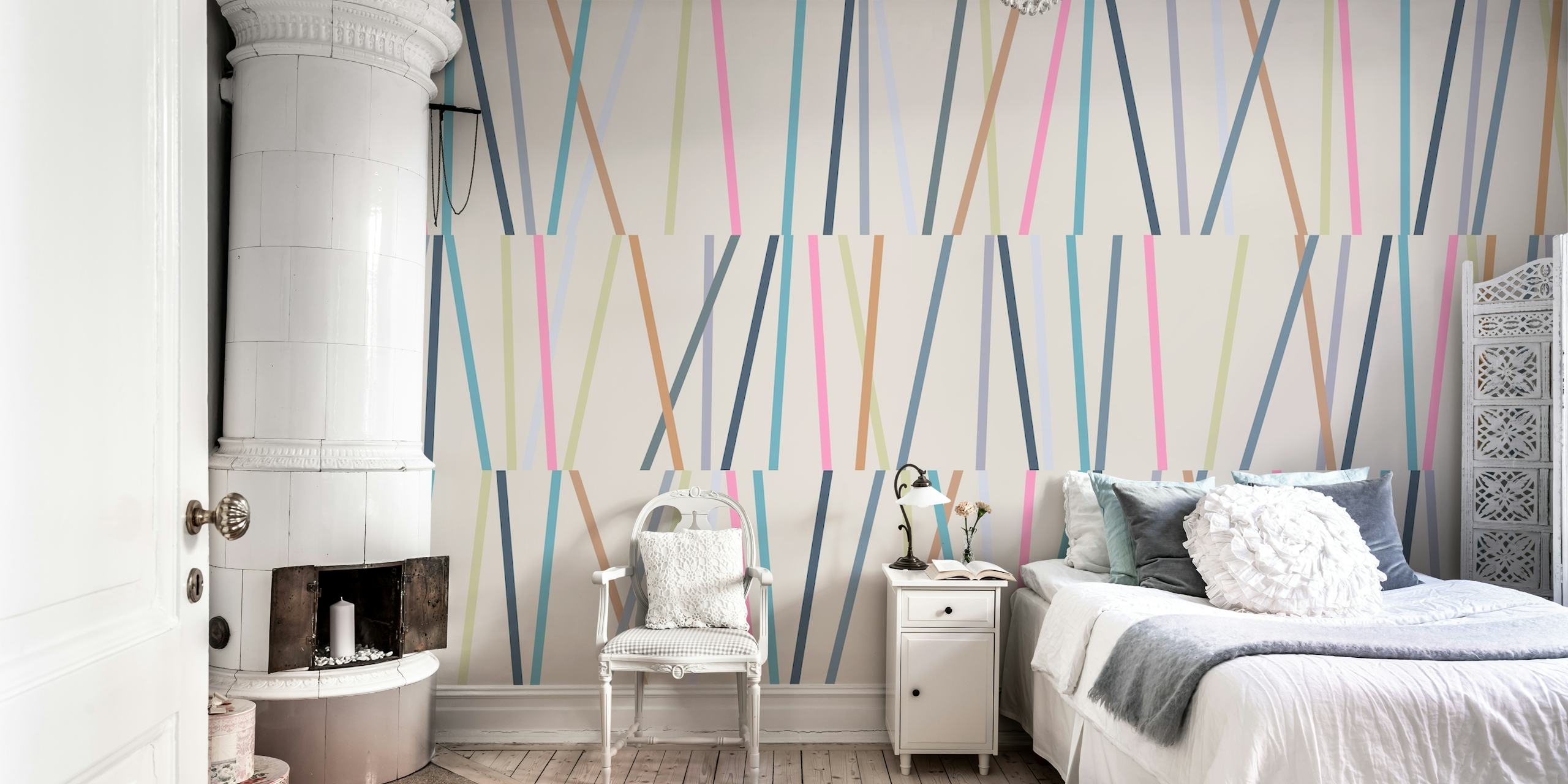 Geometric lines in pink, blue, beige, and green on cream wallpaper