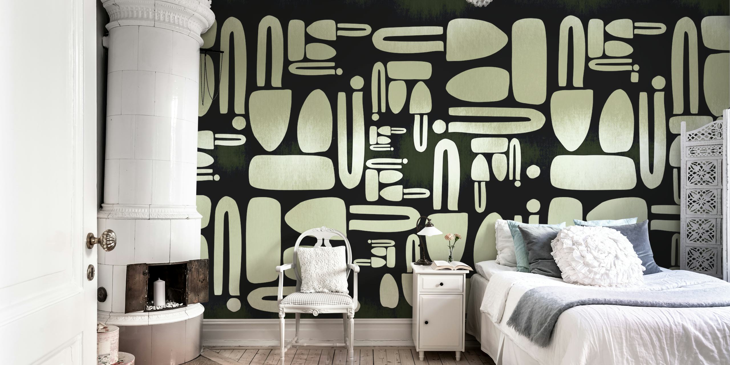 Geometric shapes in soft green and black on wallpaper