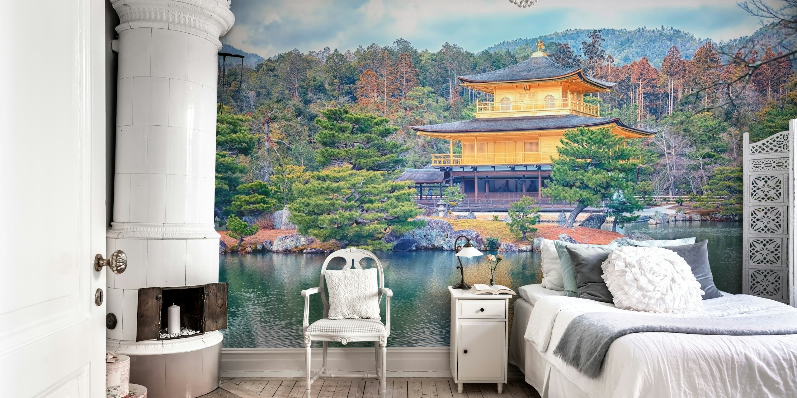 Japanese golden temple surrounded by trees and water wallpaper